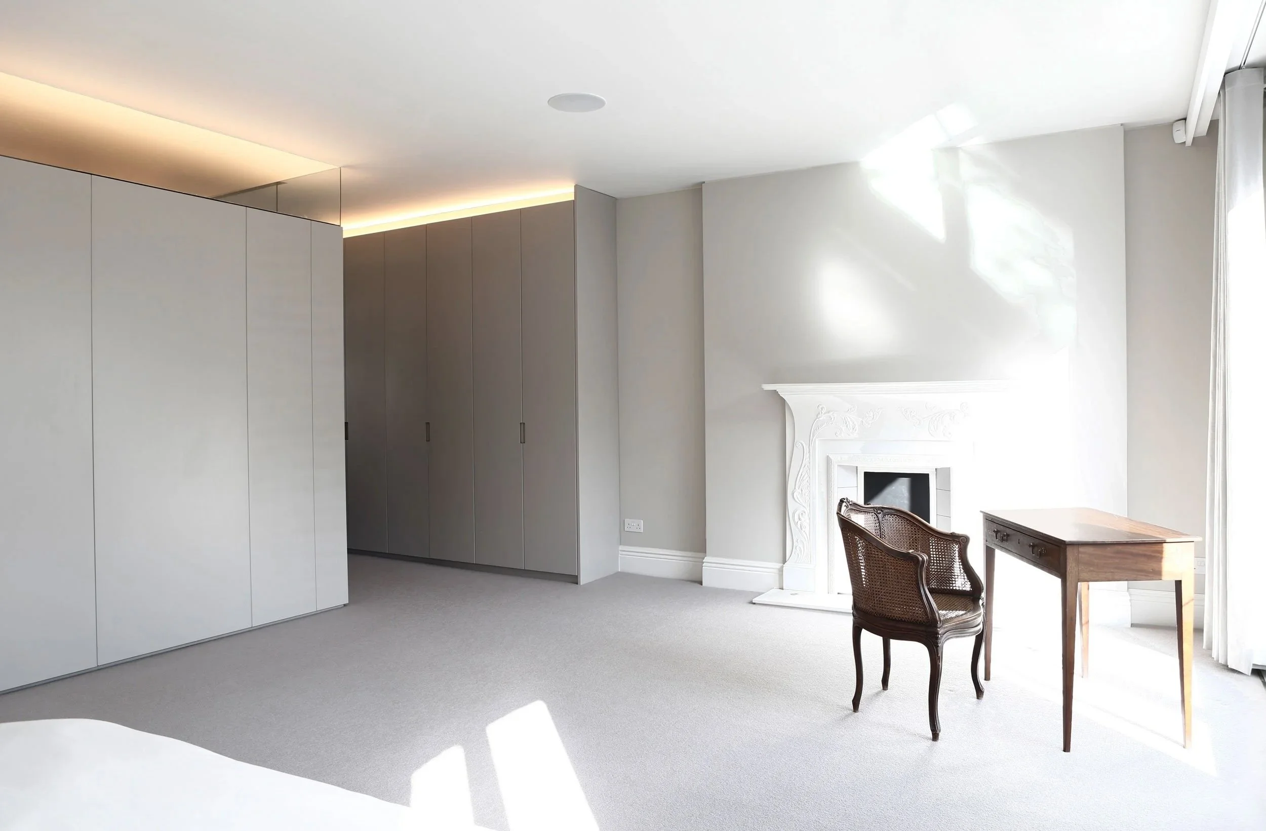 Interior view of bedroom and bespoke wardrobes at Howitt Road