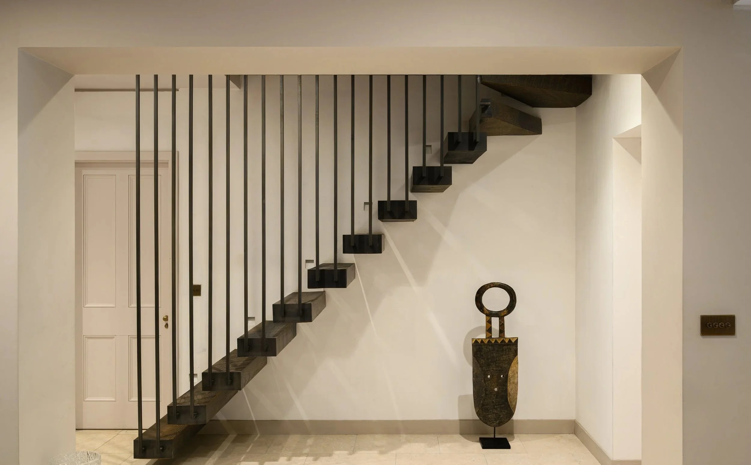 Interior view of floating staircase at Maida Vale 1