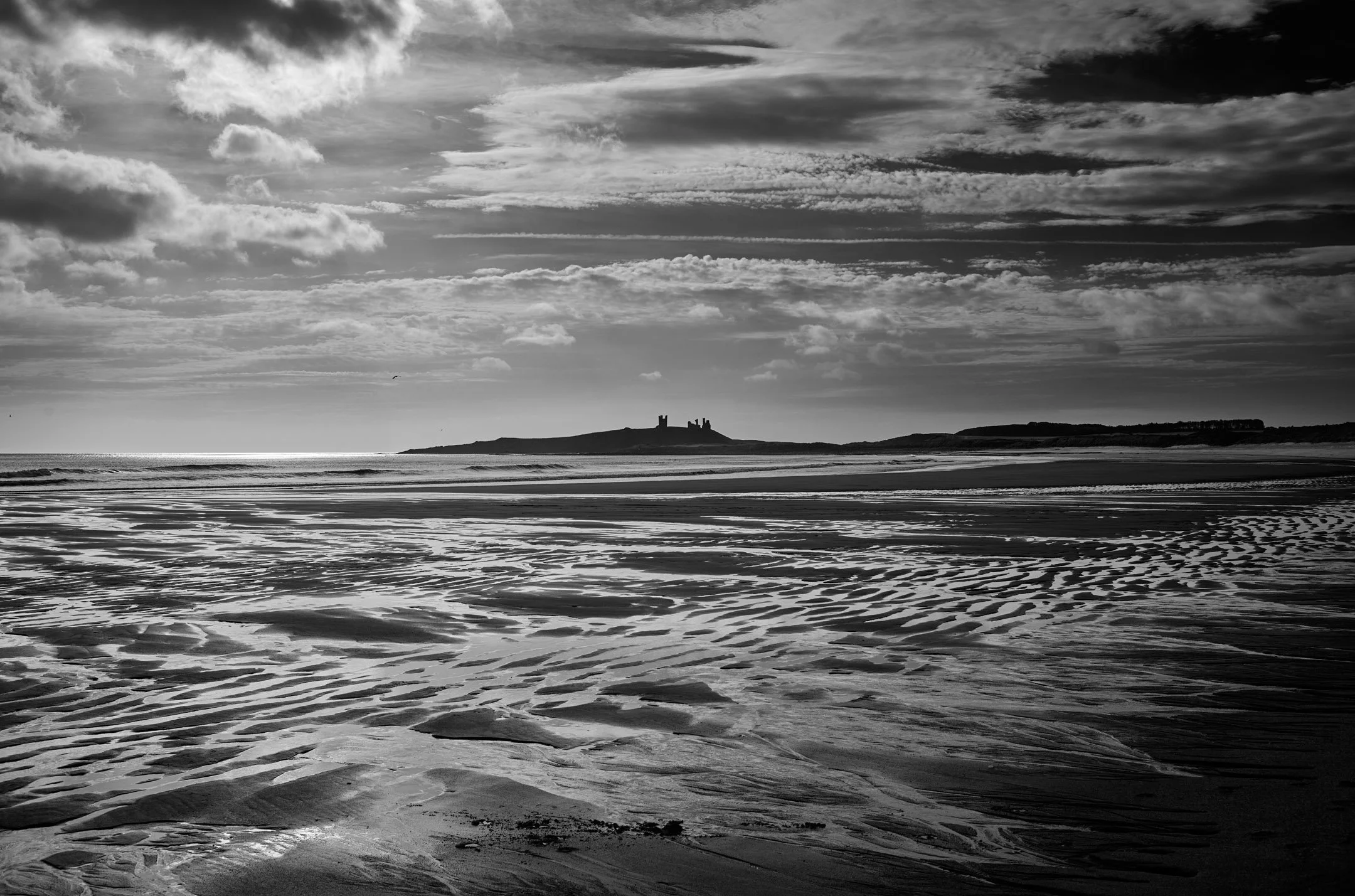 Shifting Sands and Bamburgh Castle.