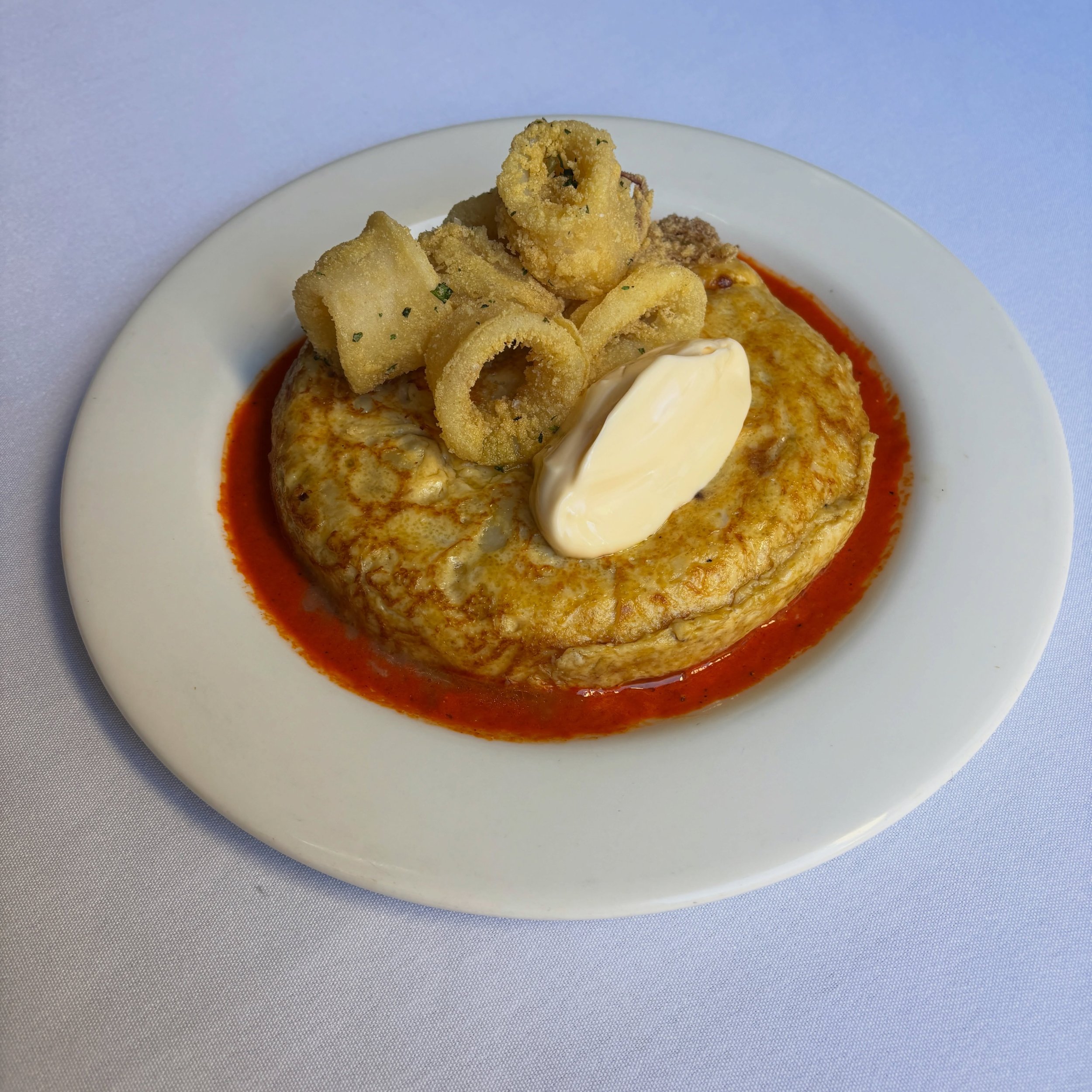 ~ 𝓟𝓵𝓪𝓽 𝓭𝓾 𝓑𝓪𝓻 ~

A just-set Spanish tortilla, soft and unctuous at its centre, with a good dollop of aioli, crisp fried calamari and a bright piquillo pepper sauce.

This week&rsquo;s counter meal in the wine bar: $35 with a glass of wine, T