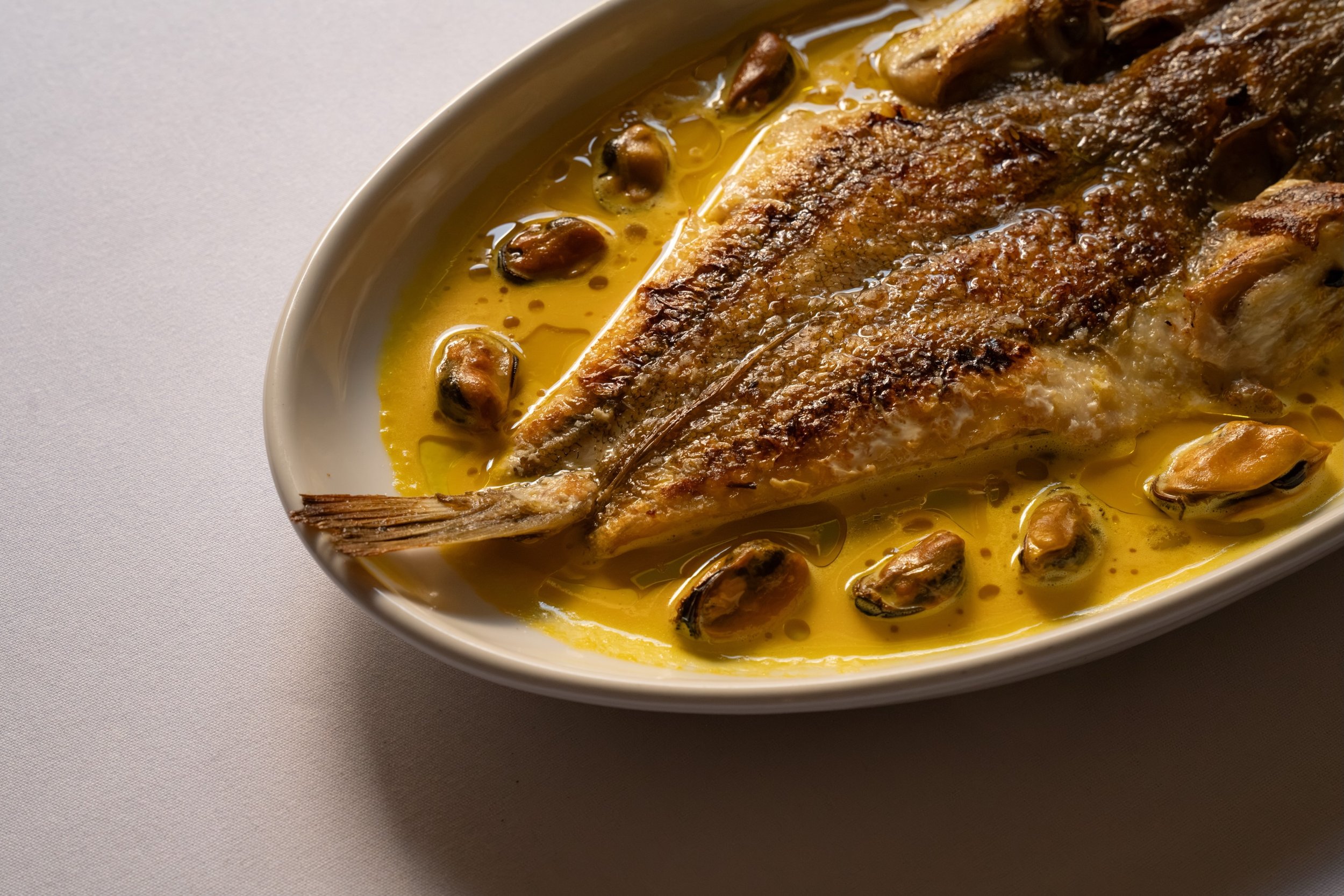 Whole flathead, reverse butterflied, with mussels and saffron velout&eacute;

New to the &agrave; la carte menu in Th&eacute; Dining Room upstairs

📸 @_bellawild