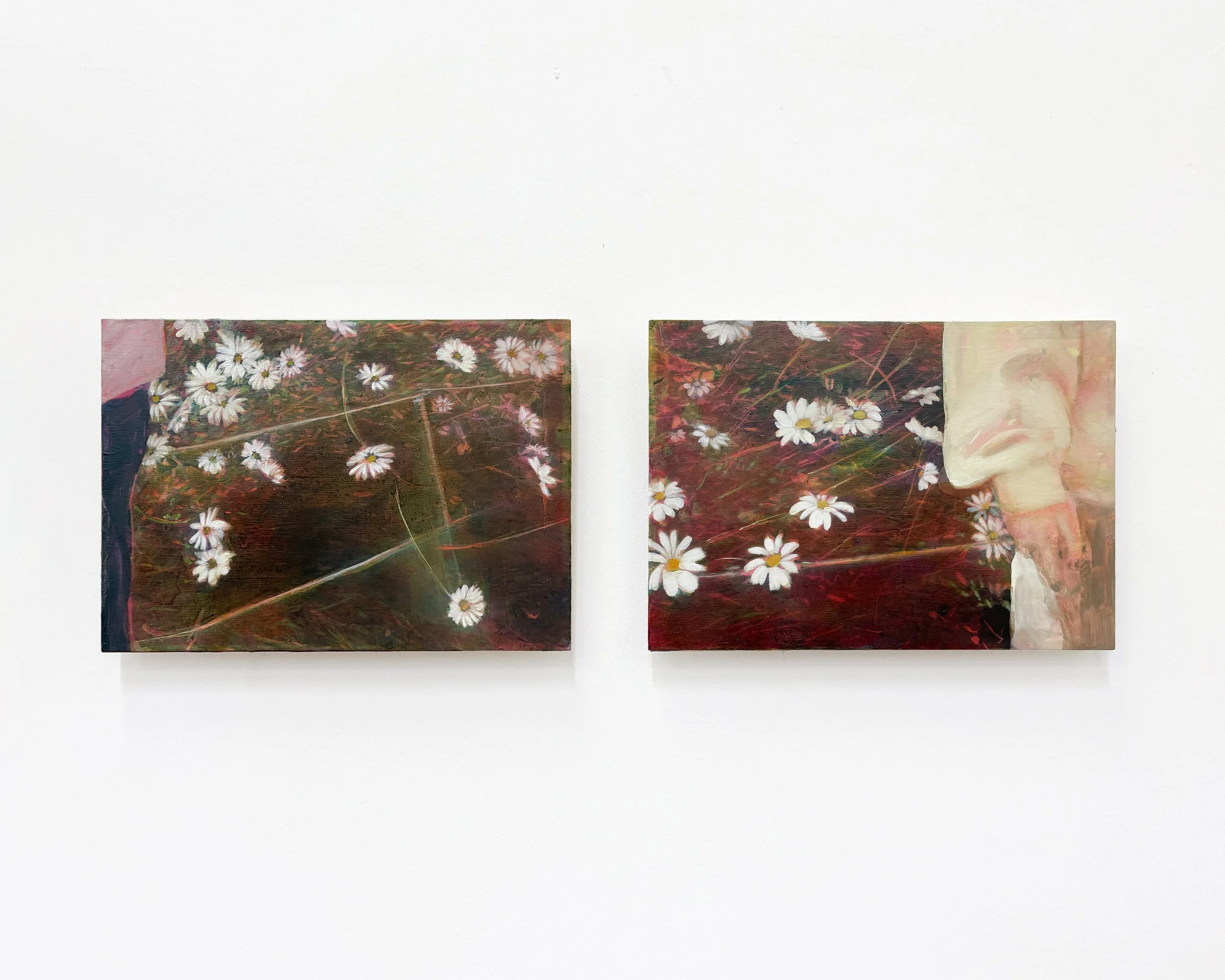 Two abstract art pieces with floral and textured designs hung on a white gallery wall.