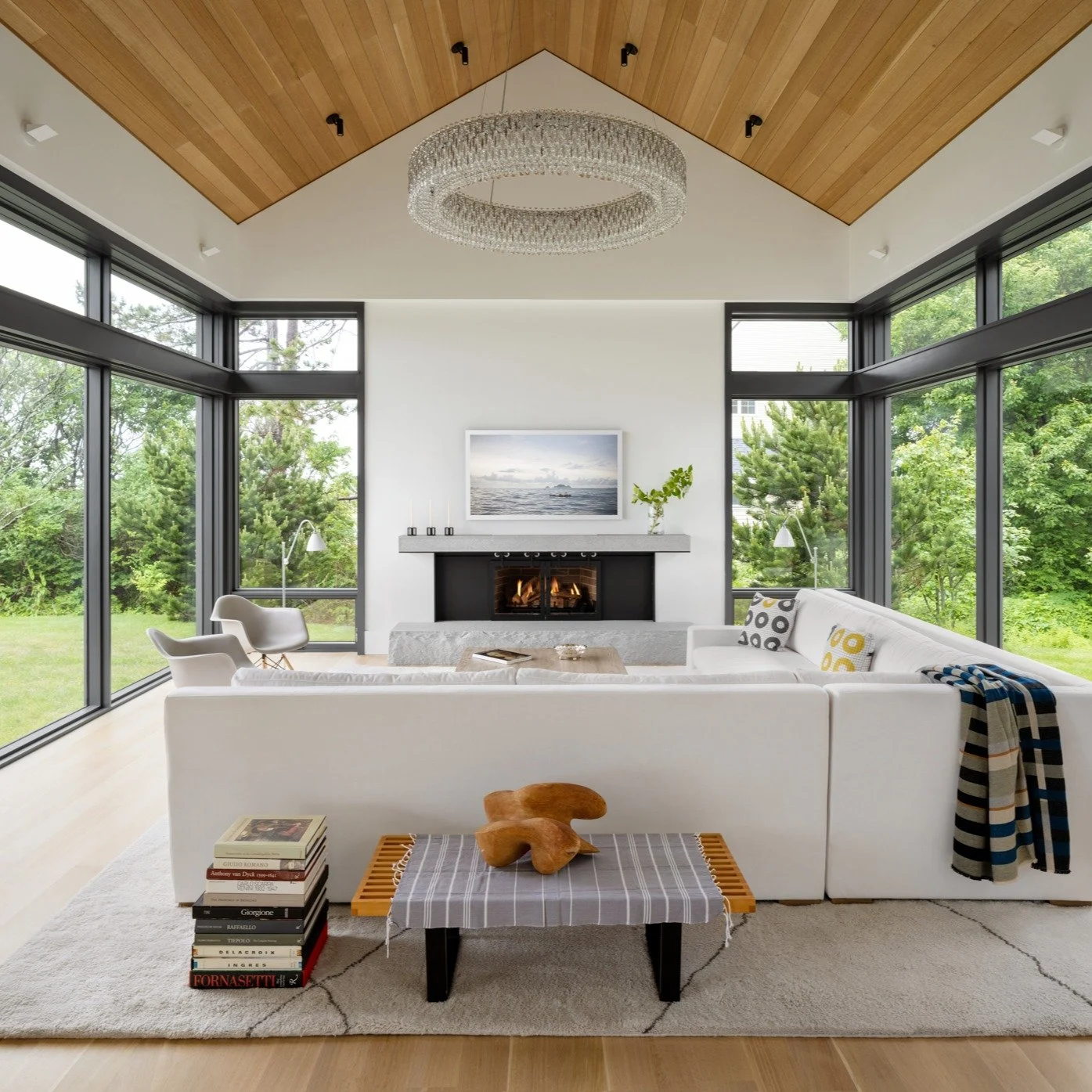 The living room at Maine Coast House is beautifully measured. A sweeping ocean vista to the left is balanced by views of a private garden on the right. The stone hearth and oak ceiling add natural warmth and texture to the modern geometry.

Landscape