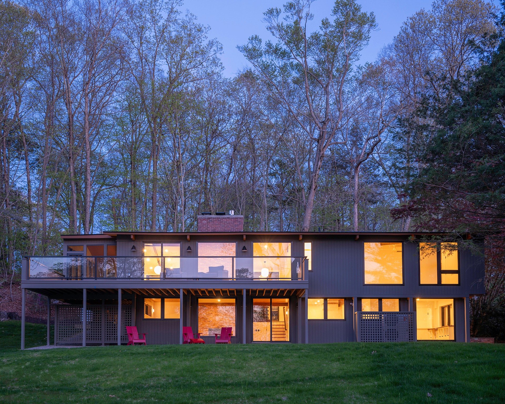 A rare New England transformation. 5 Hemlock Drive in Essex, CT is a 1972 Acorn Deck House overlooking the Connecticut River, redesigned by MGa.