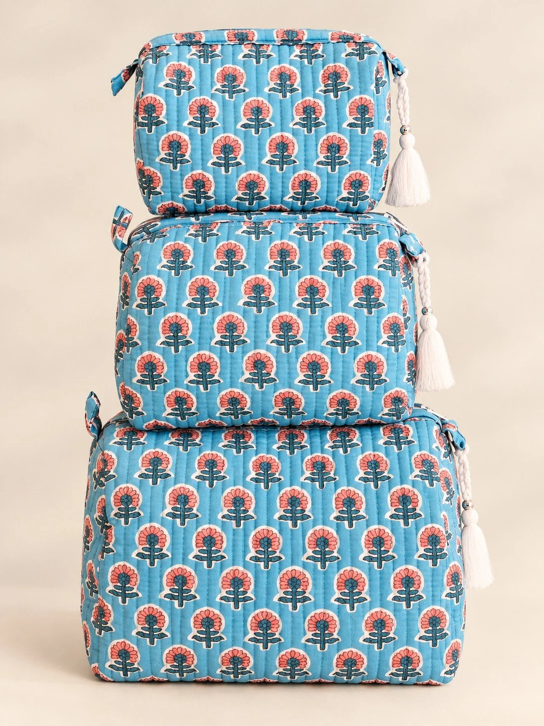 Stacked Blue Floral Quilted Pouches.jpg