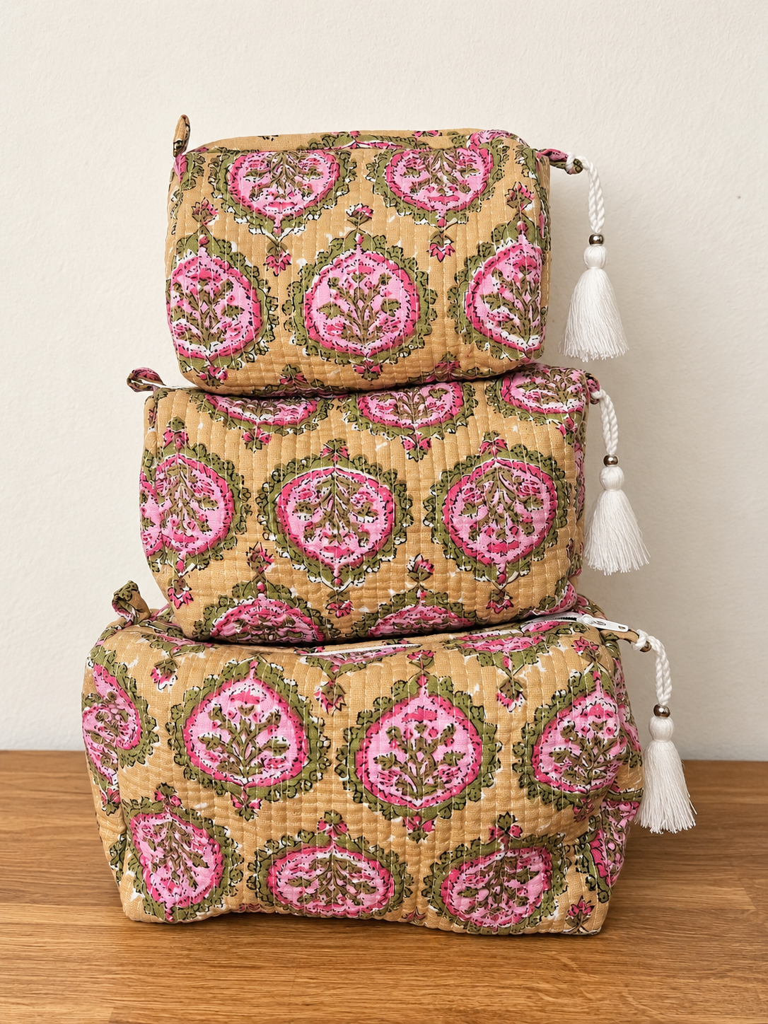 Stacked Floral Quilted Pouches.png