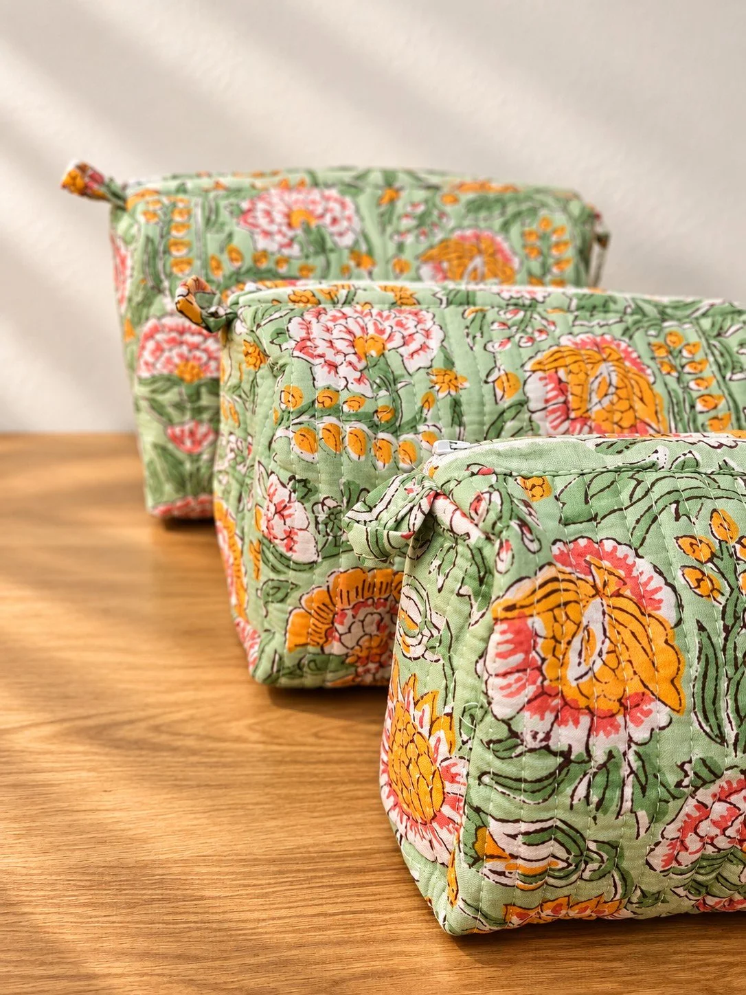 Quilted Floral Pouches in Warm Light.jpg