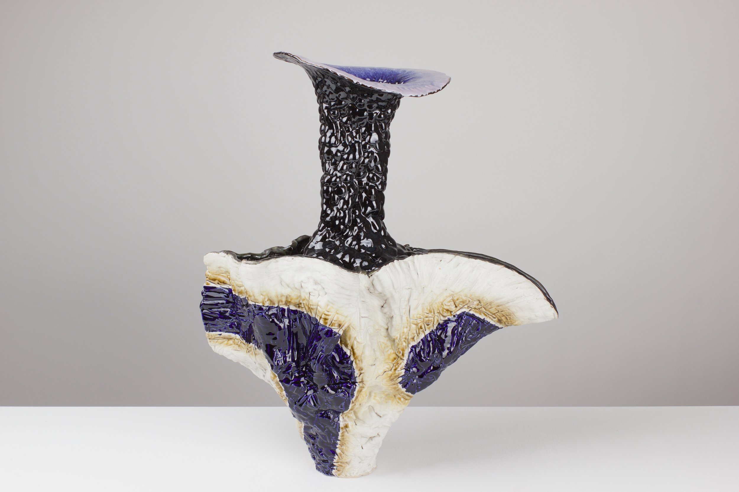 Exot, 2025. White clay, engobe, glaze. 65x60x31cm