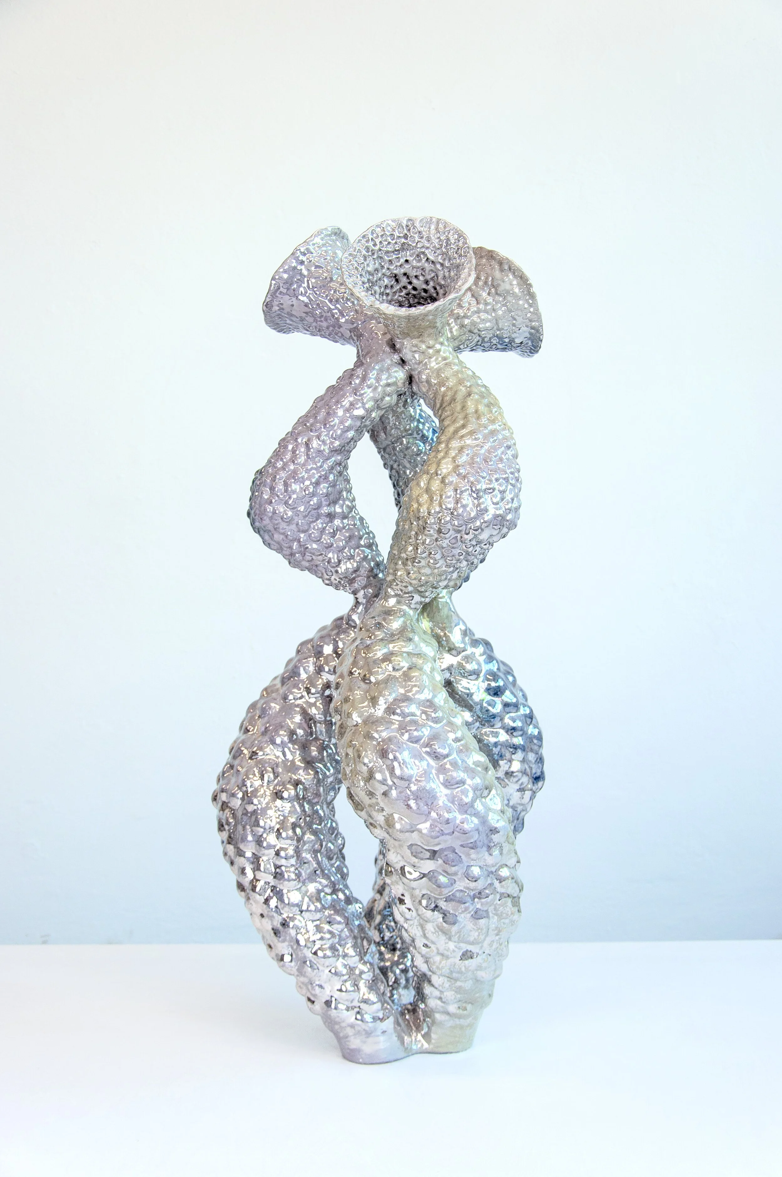 sonic swirl, 2024. White clay, engobe, glaze, platinum. 90x55x58cm