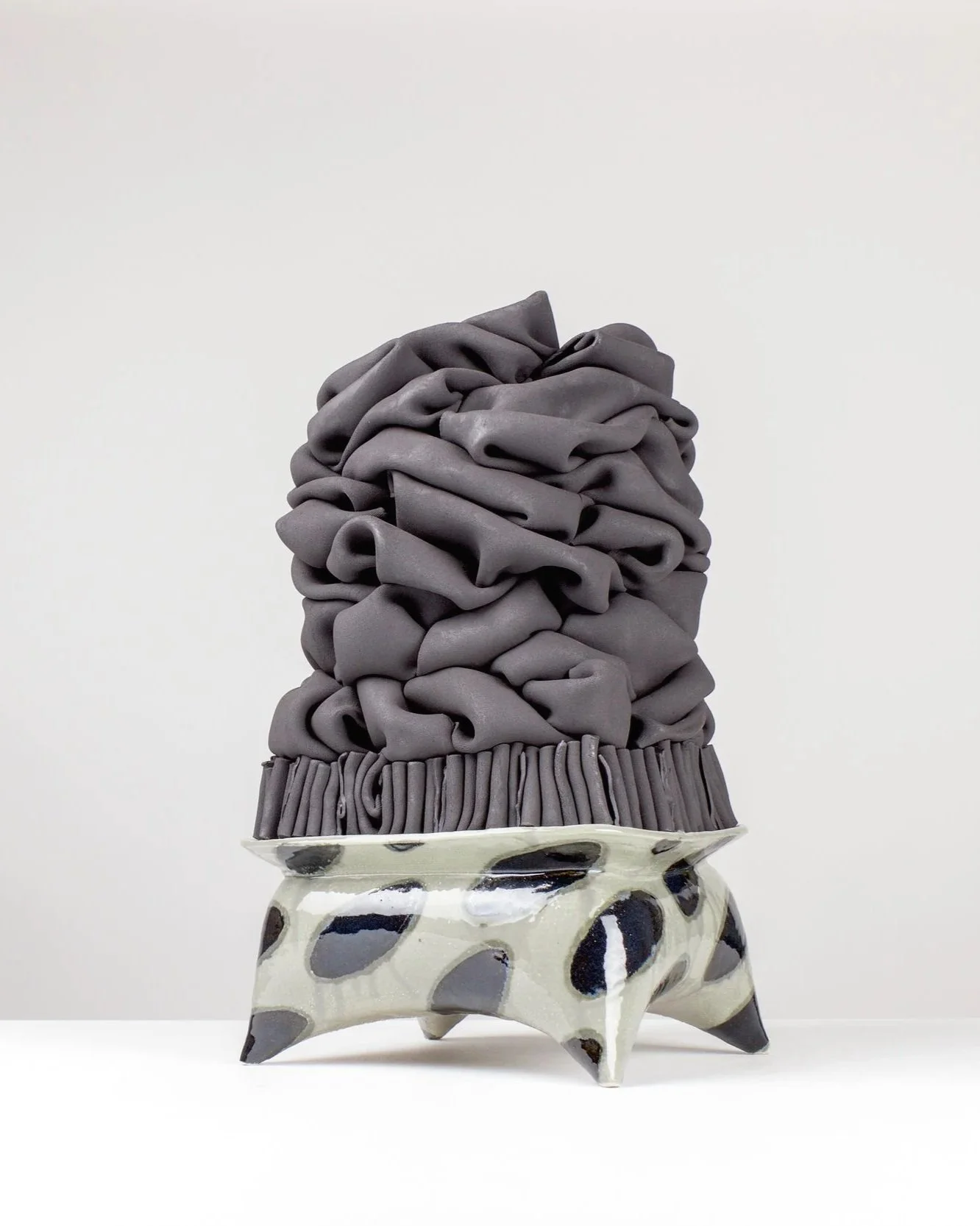 Faltengebirge II, 2025. White clay, black clay, engobe, glaze. 52x30x26cm