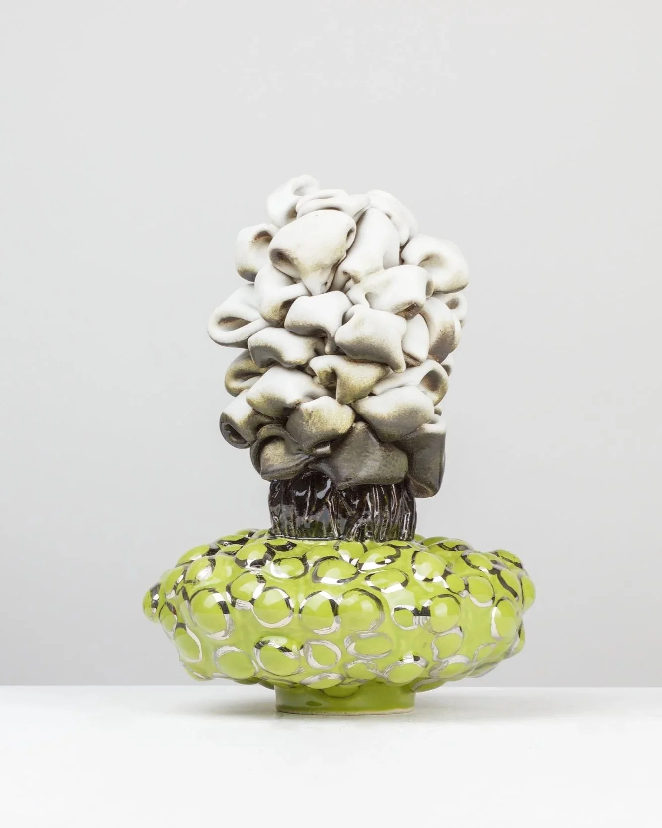 Timberline, 2026. White clay, engobe, glaze, platinum. 31x22x23cm