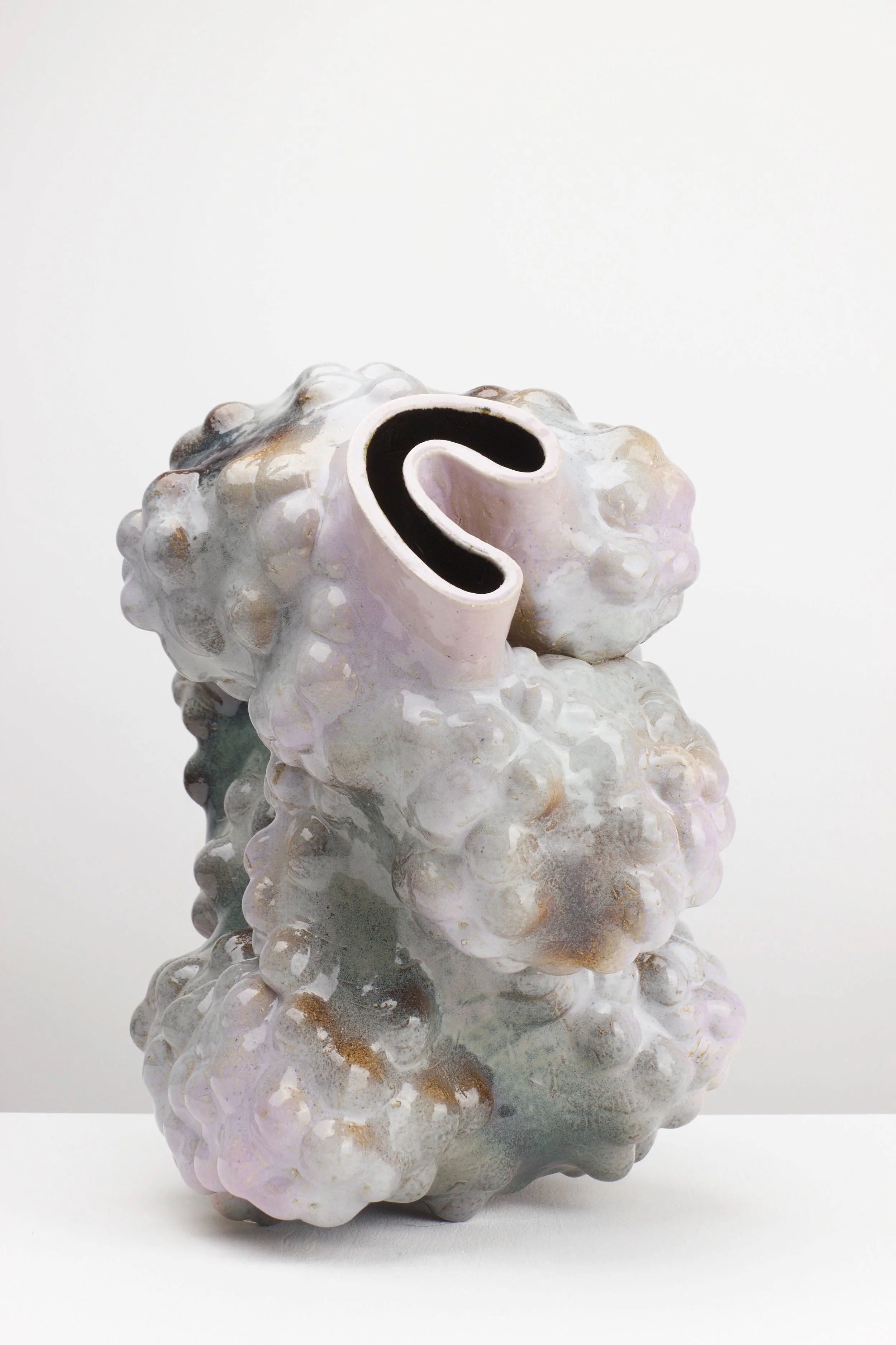 DETAIL Chewing gum, 2026. White clay, engobe, glaze. 51x45x29cm