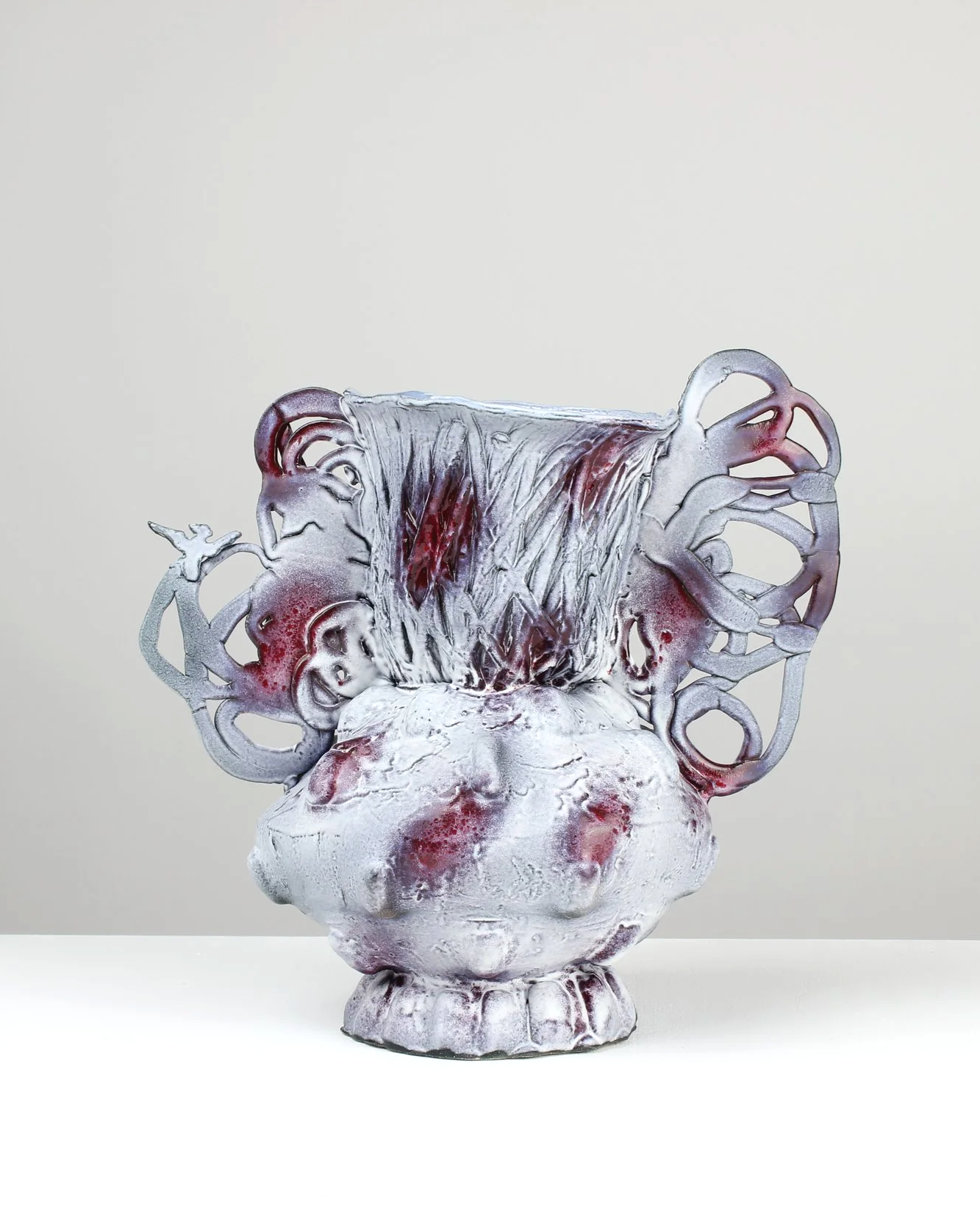 #25/12/25, 2025. White clay, engobe, glaze. 
33x32x22cm