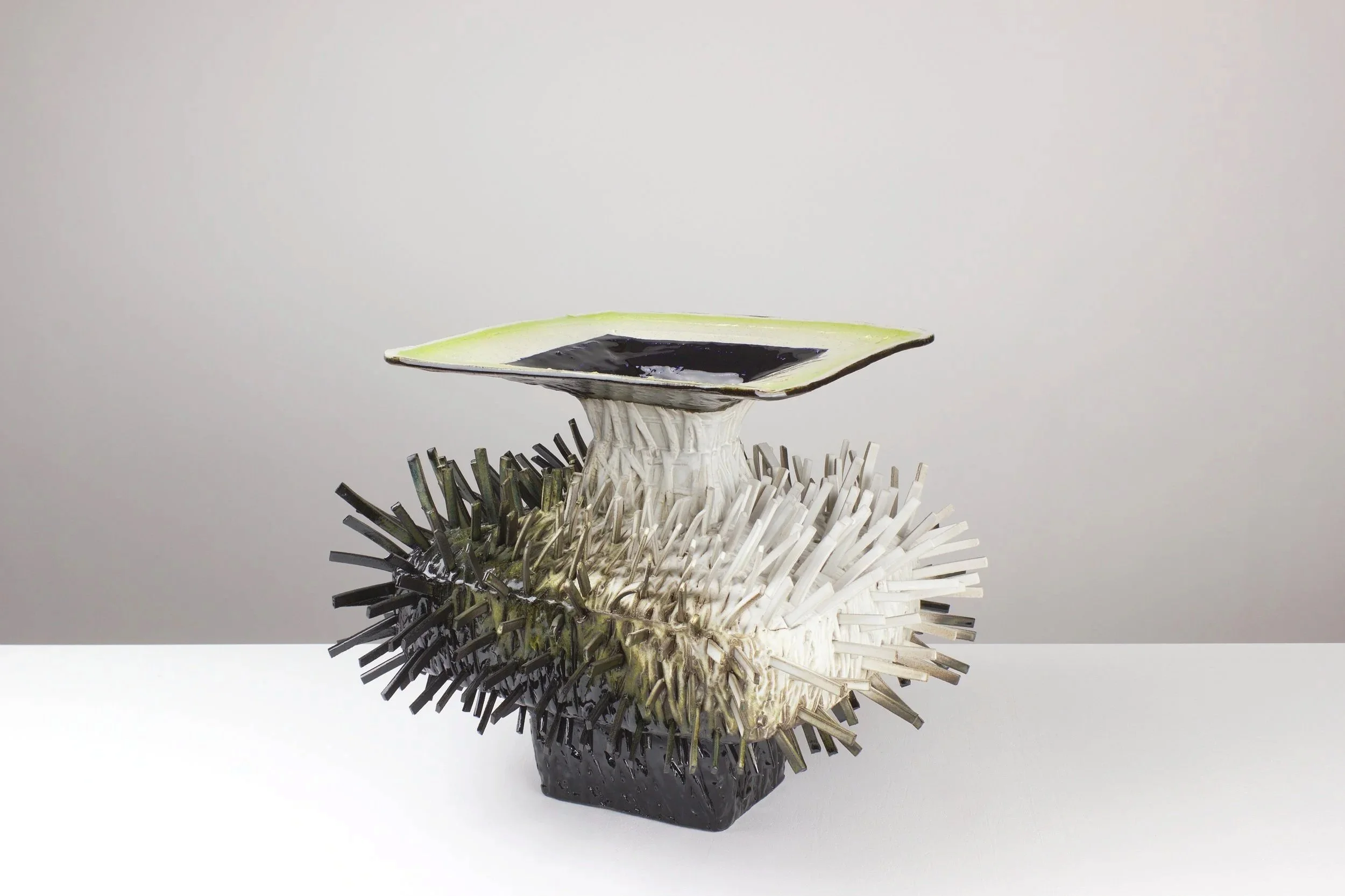 Schattentheater, 2025. White clay, engobe, glaze. 42x50x47cm