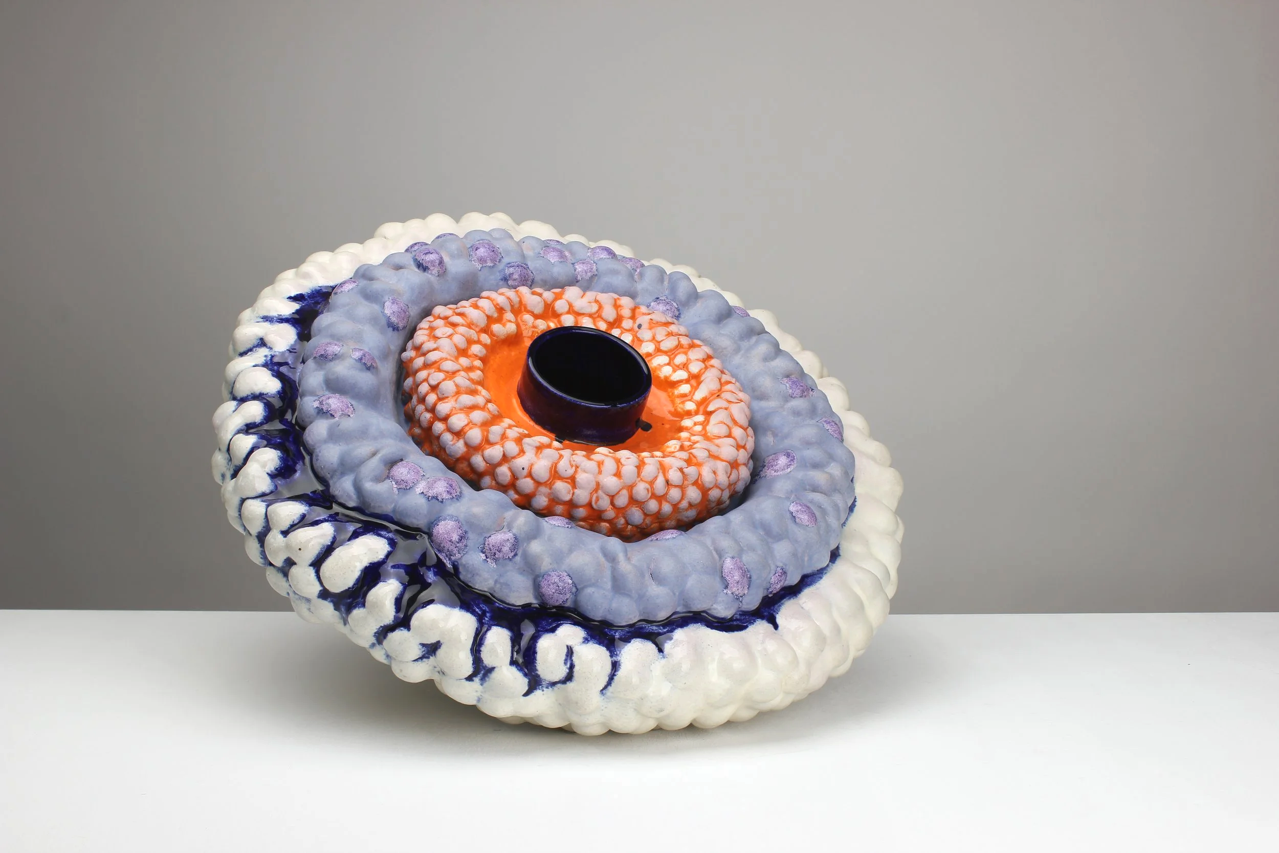 L' ombelico del mondo, 2023. White clay, engobe, glaze. 29x57x55cm