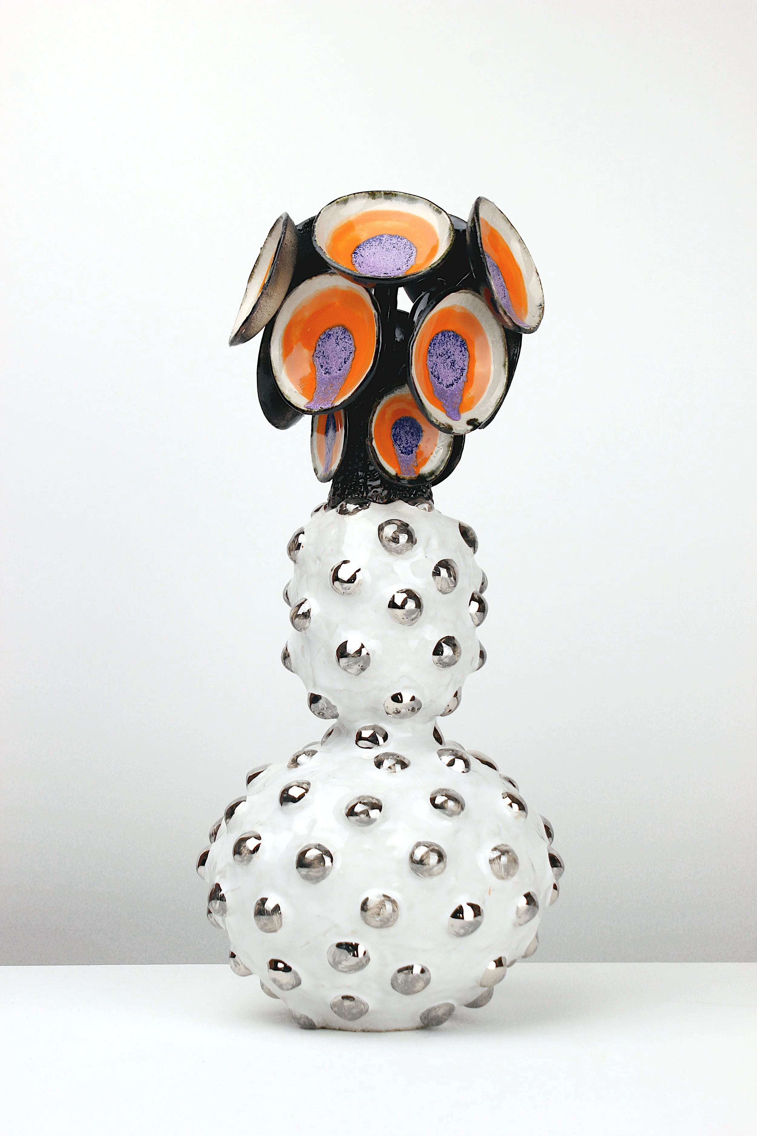 Anna, 2026. White clay, engobe, glaze, platinum. 55x20x21cm