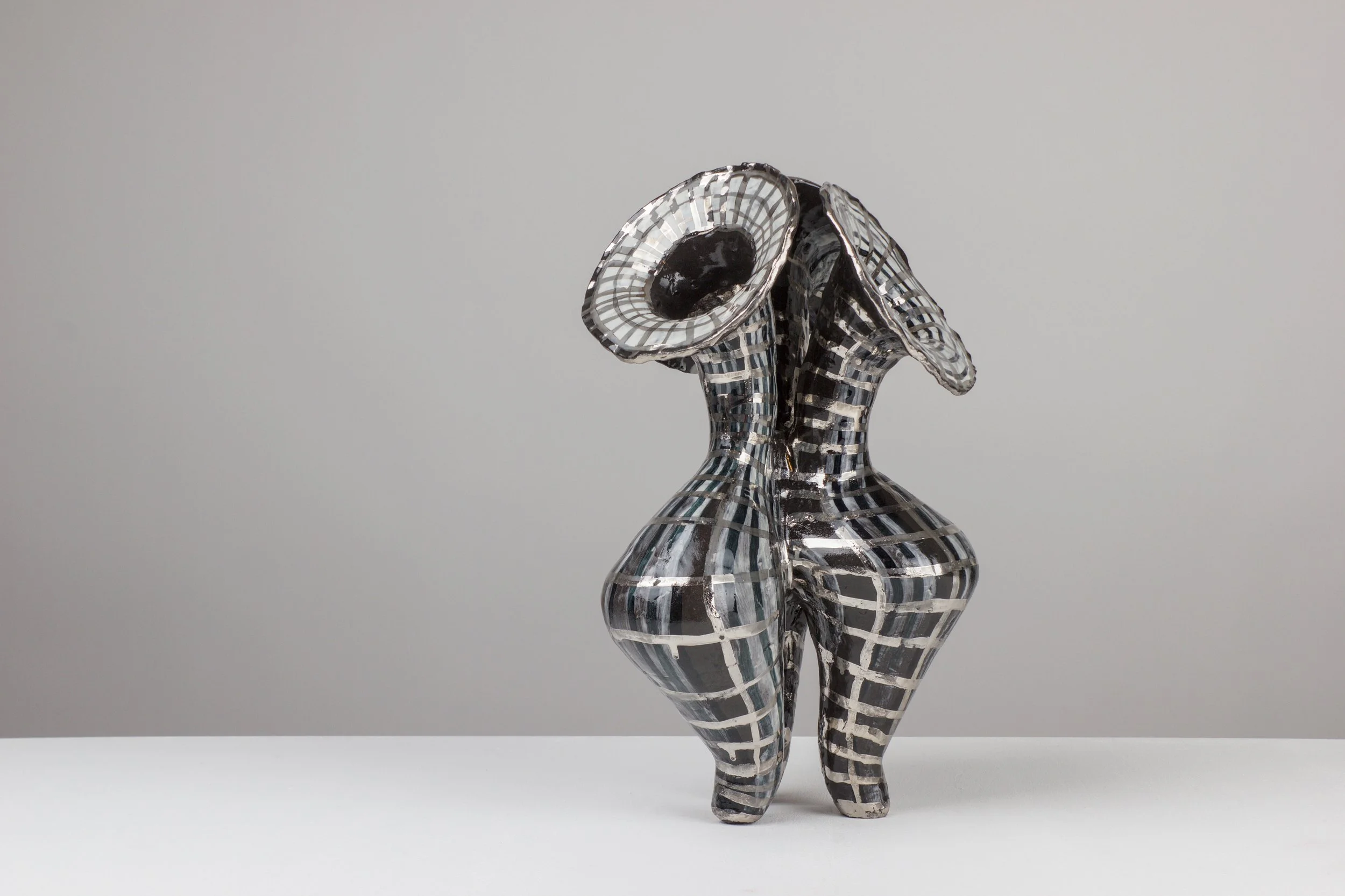 #4/02/25, 2025. Black clay, engobe, glaze, platinum. 39x24x25cm