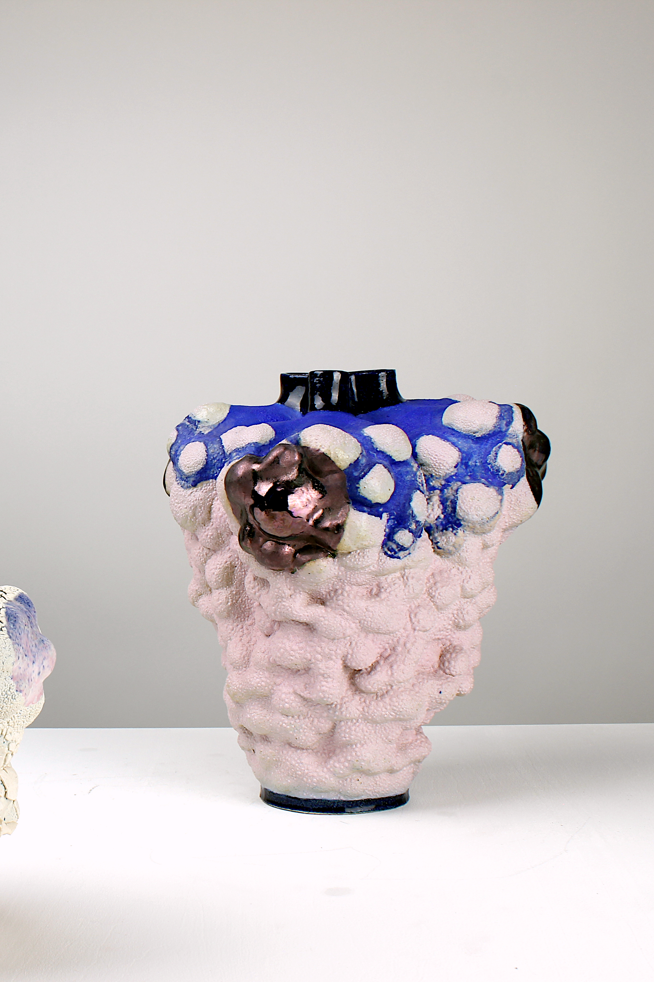 O.T., 2024. White clay, engobe, glaze, lustre. 35x32x27cm