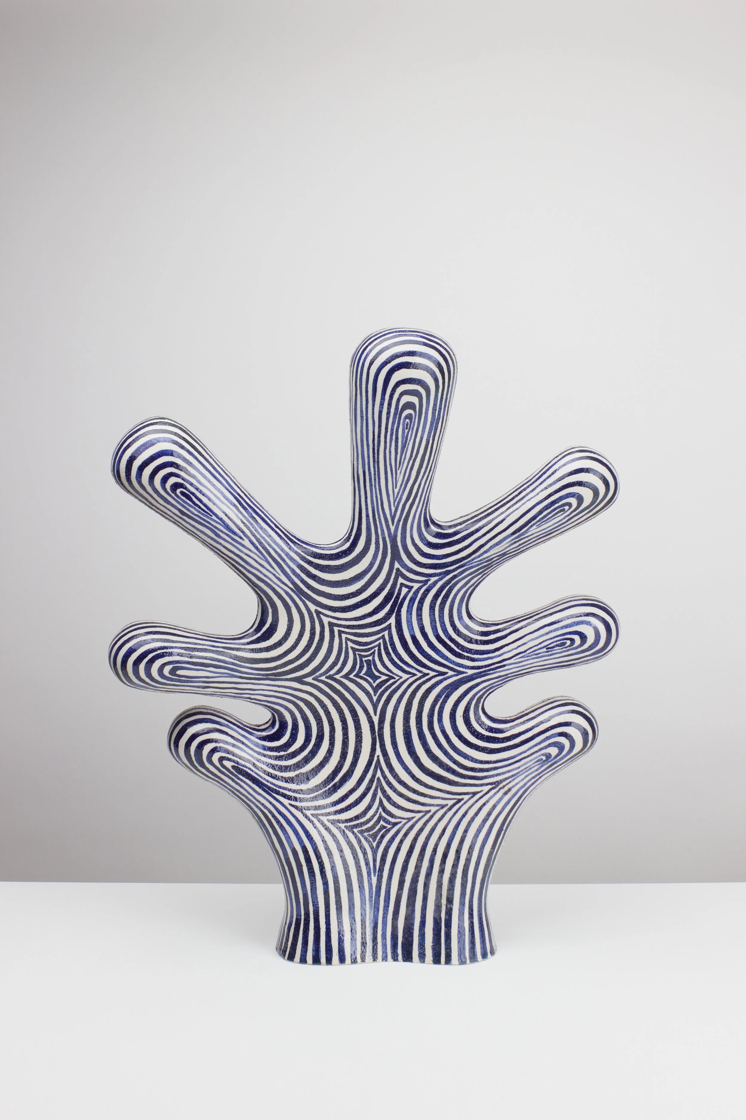 Hugs II, 2026. White clay, engobe, glaze. 62x50x13cm 