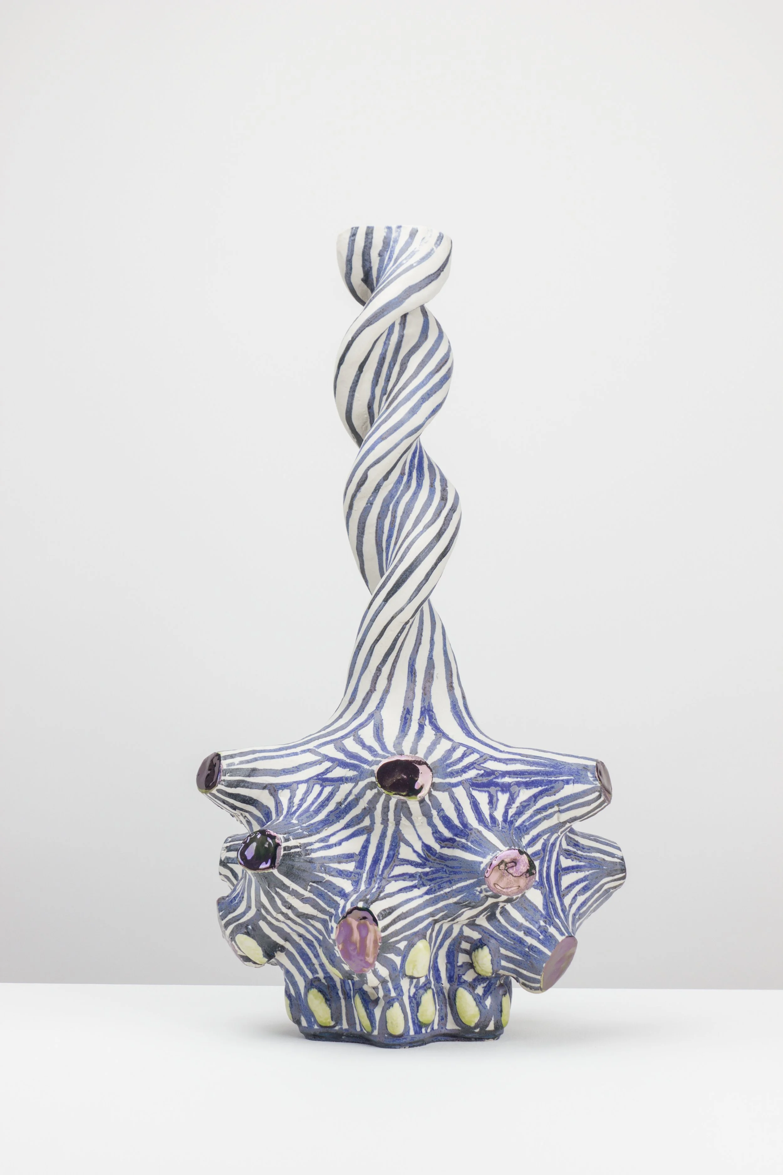 Tiefseeschnecke, 2026.
White clay, engobe, glaze, lustre. 
52x28x27cm
