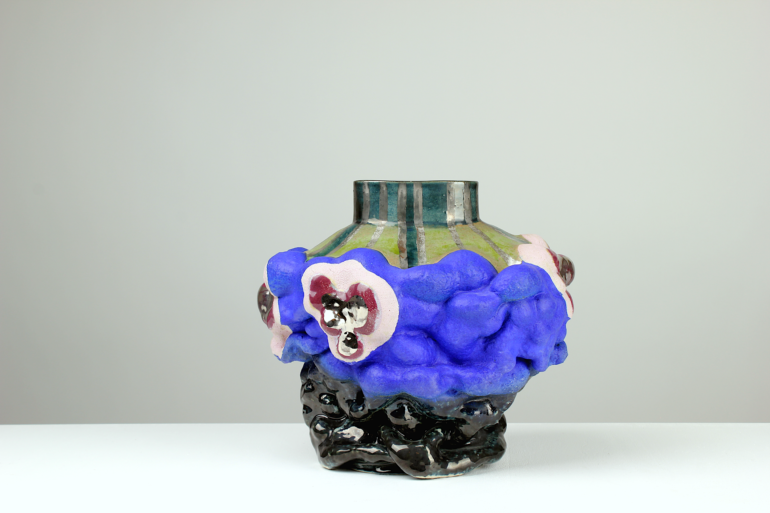 O.T., 2024. White clay, engobe, glaze, platinum. 30x32x24cm