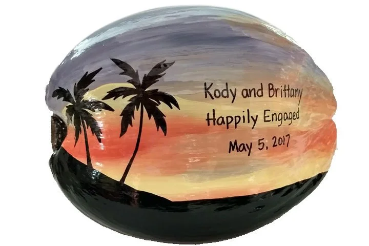 The vibrant sunset and tropical scenery hand painted on this coconut makes it the perfect Destination Wedding Save the Date and wedding invitation and announcment. We drop ship to your list.