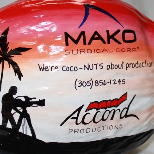 Painted coconuts for unique gifts, invitations, marketing