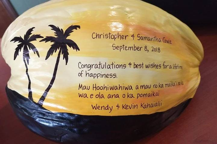 Upcycled painted coconuts make unique and custom wedding gifts