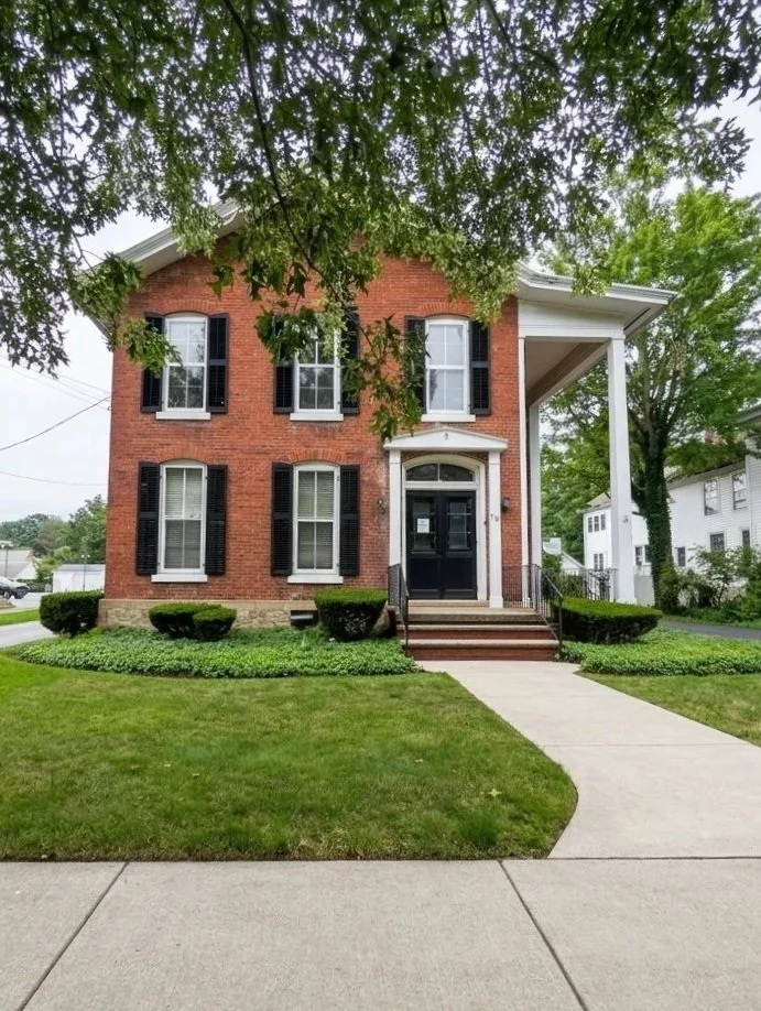 Johnson, Mackowiak & Associates, LLP's beautiful brick 70 Main Street location in Fredonia.