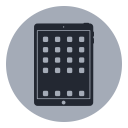 Dark gray tablet with app icons on the screen
