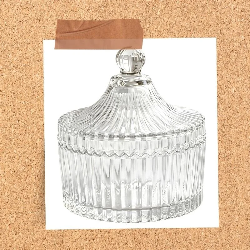 Clear ribbed glass storage jar with lid
