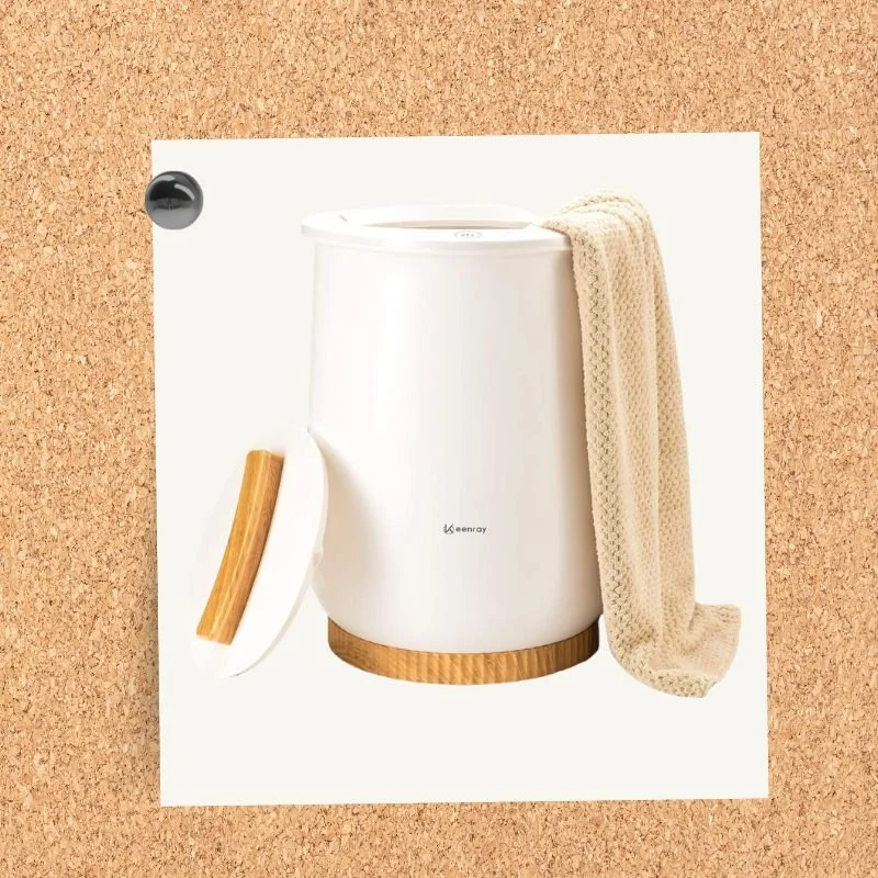 Keenray towel warmer with a towel draped over the side