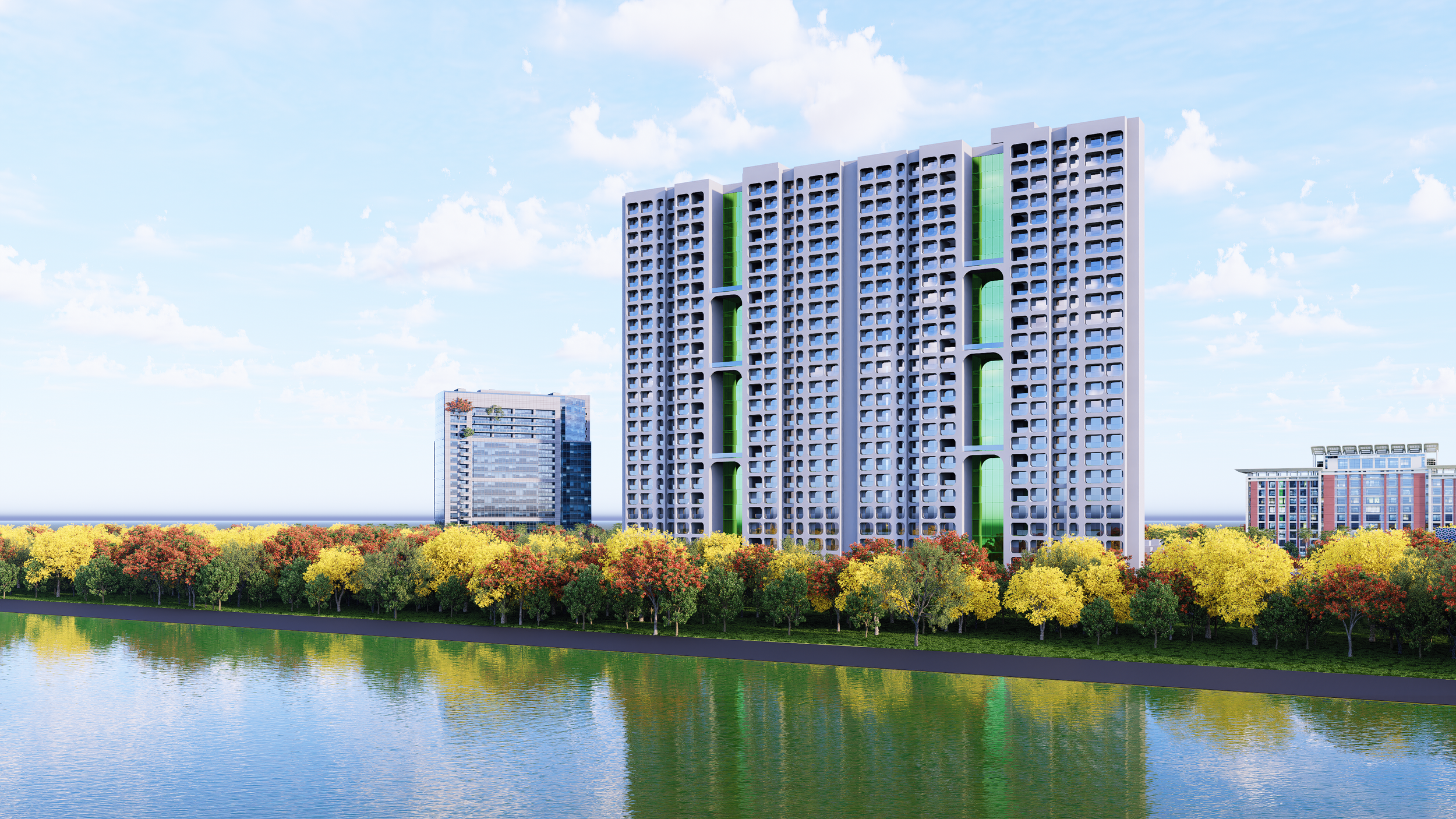 Modern high-rise building with green accents, set against a partly cloudy sky and a treeline with colorful fall foliage, near a body of water.
