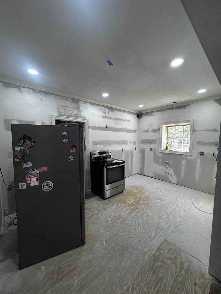  featuring drywall repairs, ceiling improvements, recessed lighting, and preparations for final finishes. 