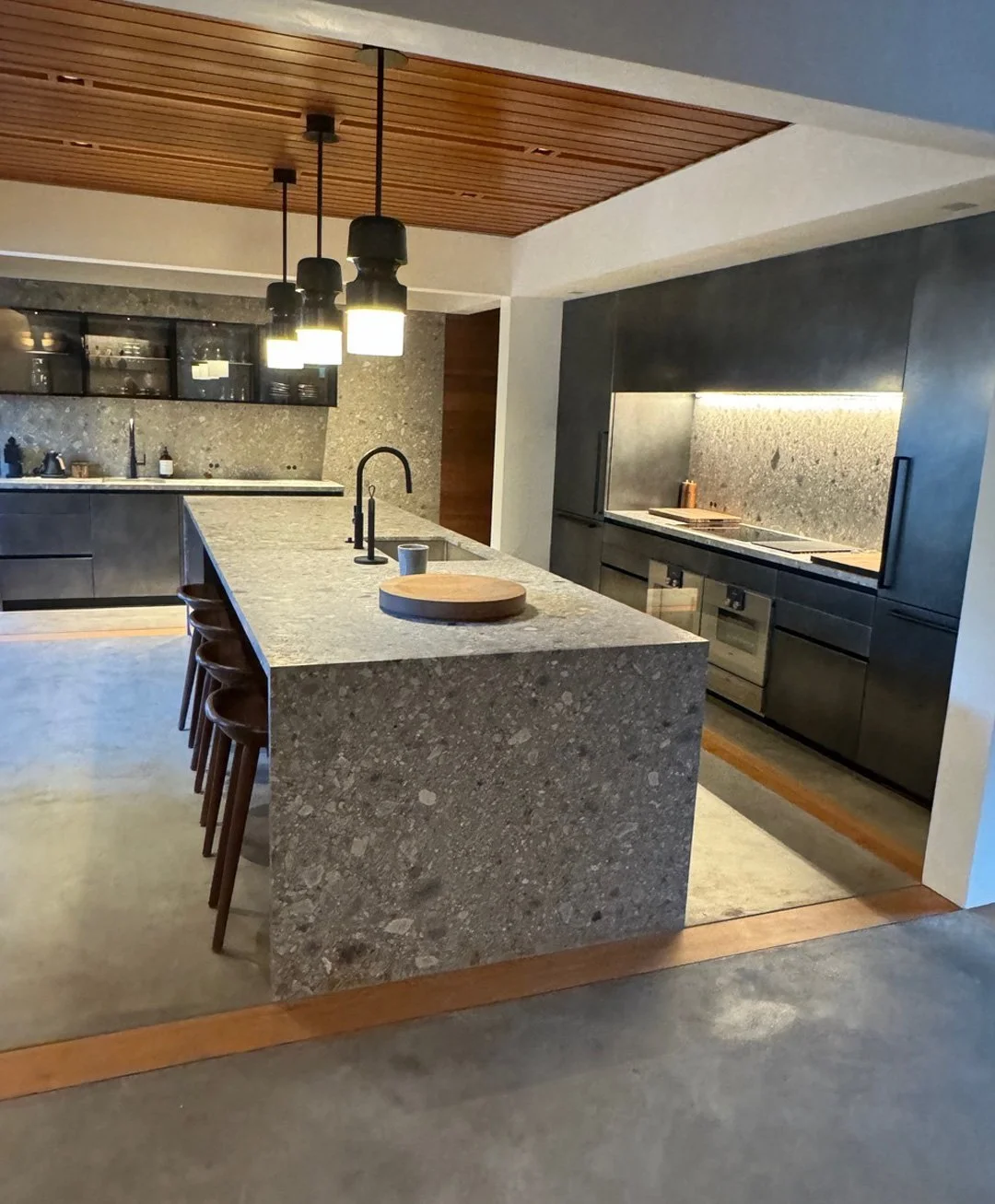 Kitchen of modern residential home with terraced lawn nestled in the mountains built by Form 44 Construction near Conundrum Creek in Aspen, CO