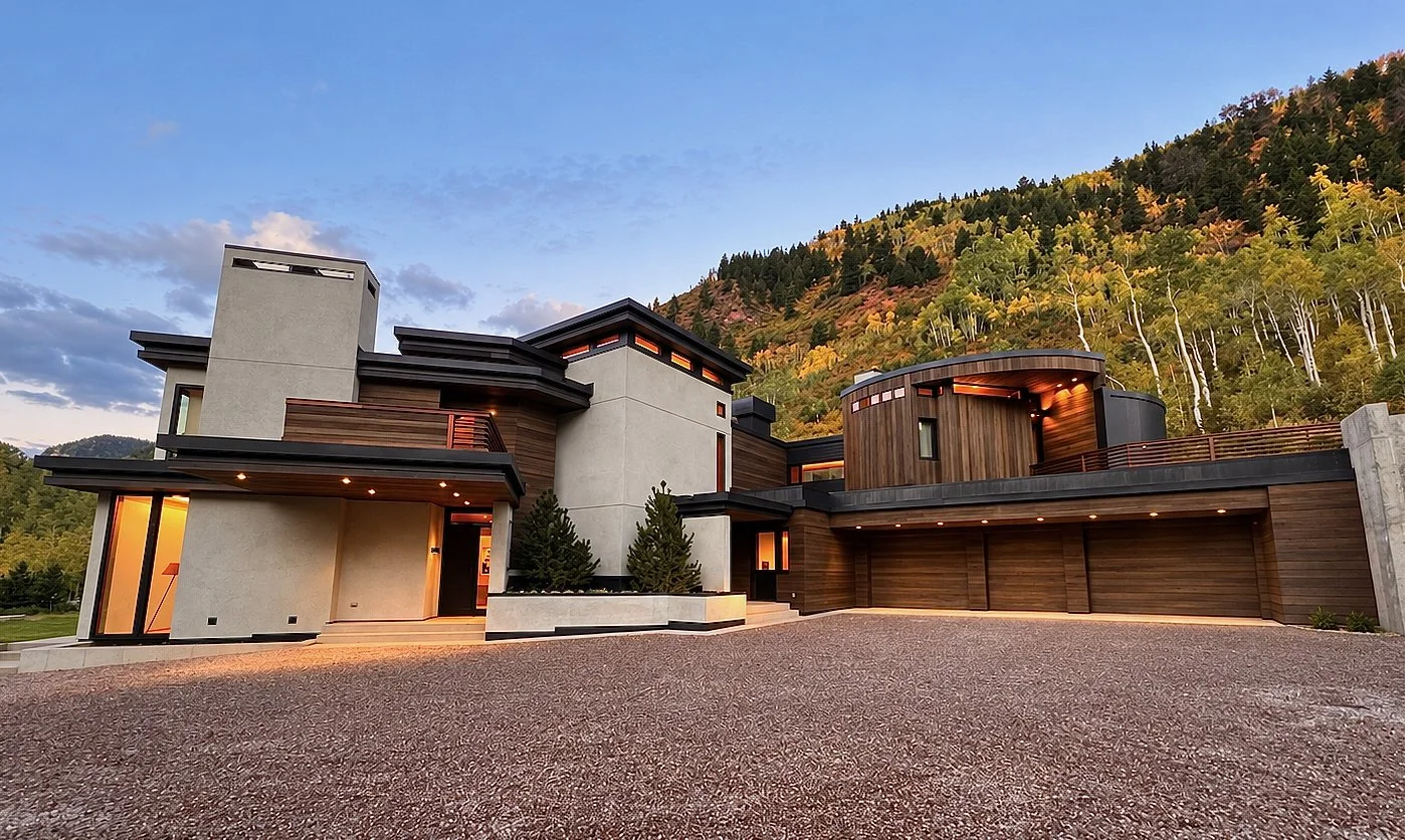 Modern residential home with terraced lawn nestled in the mountains built by Form 44 Construction near Conundrum Creek in Aspen, CO