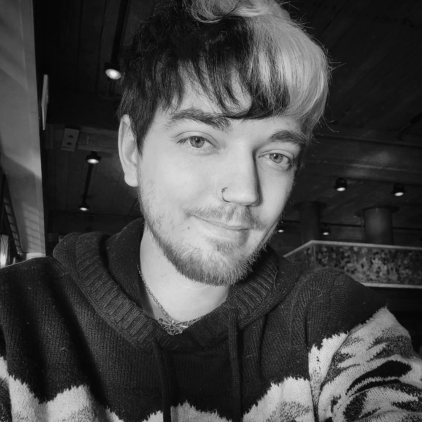Black-and-white portrait of 3D Environment Artist Shane Schultz.