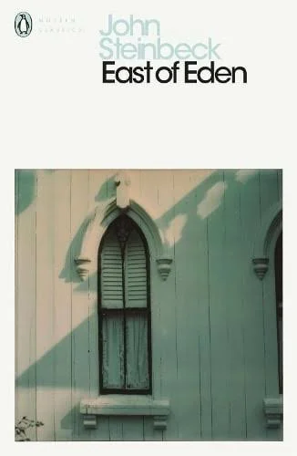 Cover of John Steinbeck's book "East of Eden" showing an old building with an arched window.