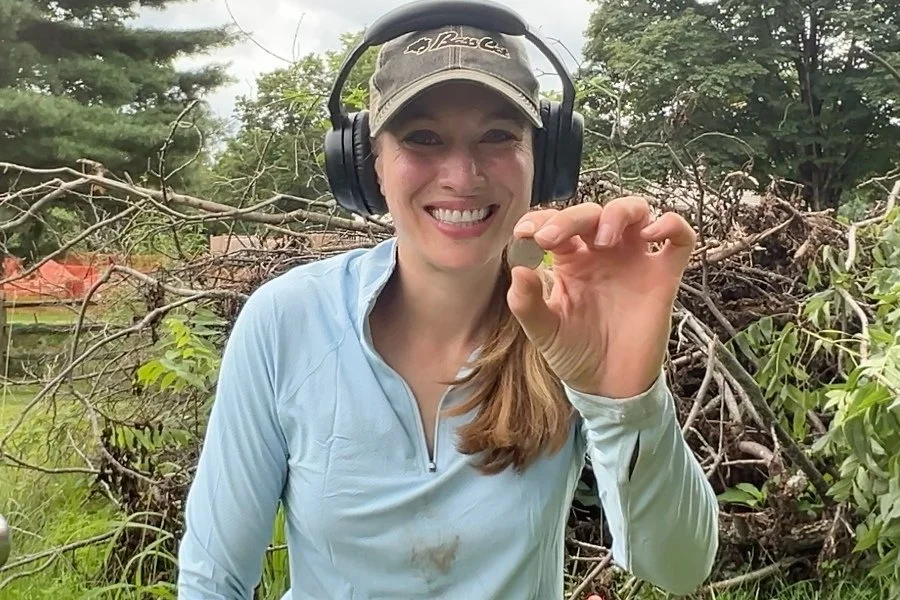 Jessica From Quarter Hoarder Holding a 1700's German Stuber Coin That She Found Metal Detecting