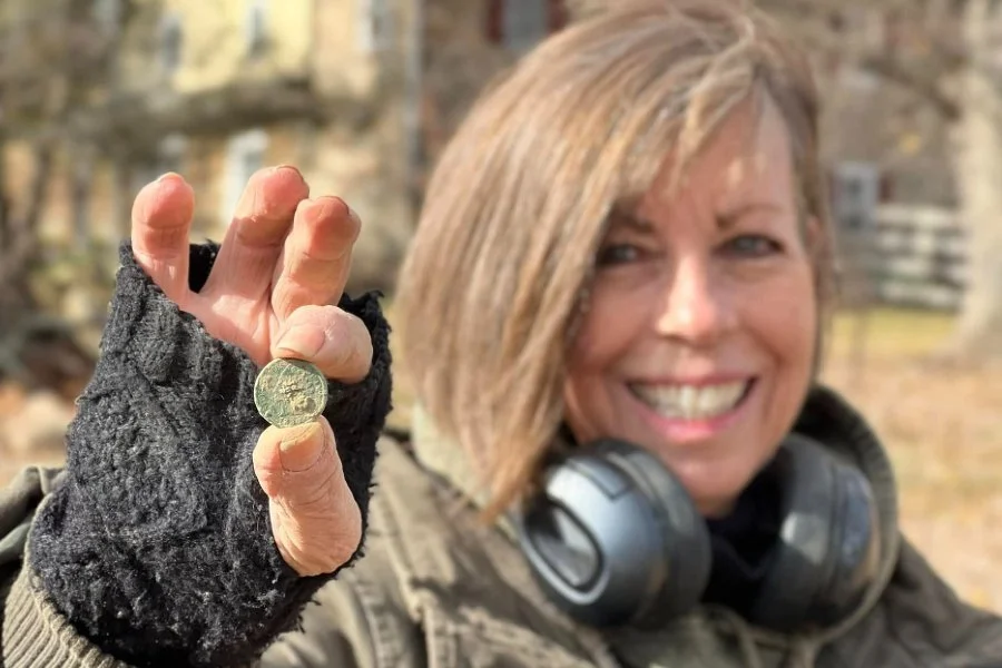 Lynne from Quarter Hoarder holding an 1800's Classic Head U.S. large cent she found metal detecting