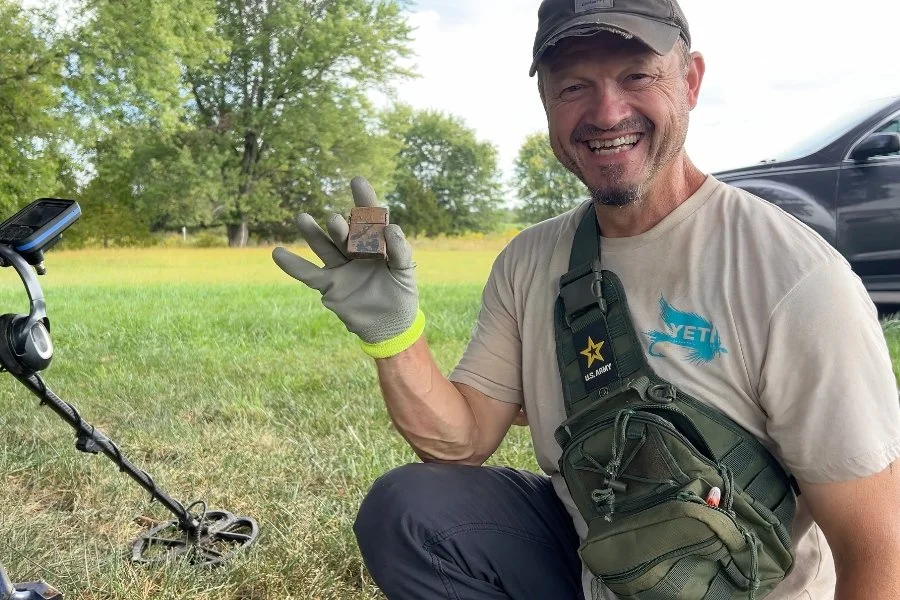 Matt from Quarter Hoarder posing with a 1960's Zippo lighter found metal detecting