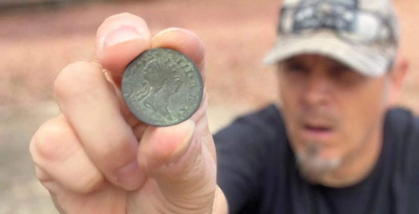 Quarter Hoarder holding a rare double struck 1769 Hibernia halfpenny found metal detecting at a 1700's house