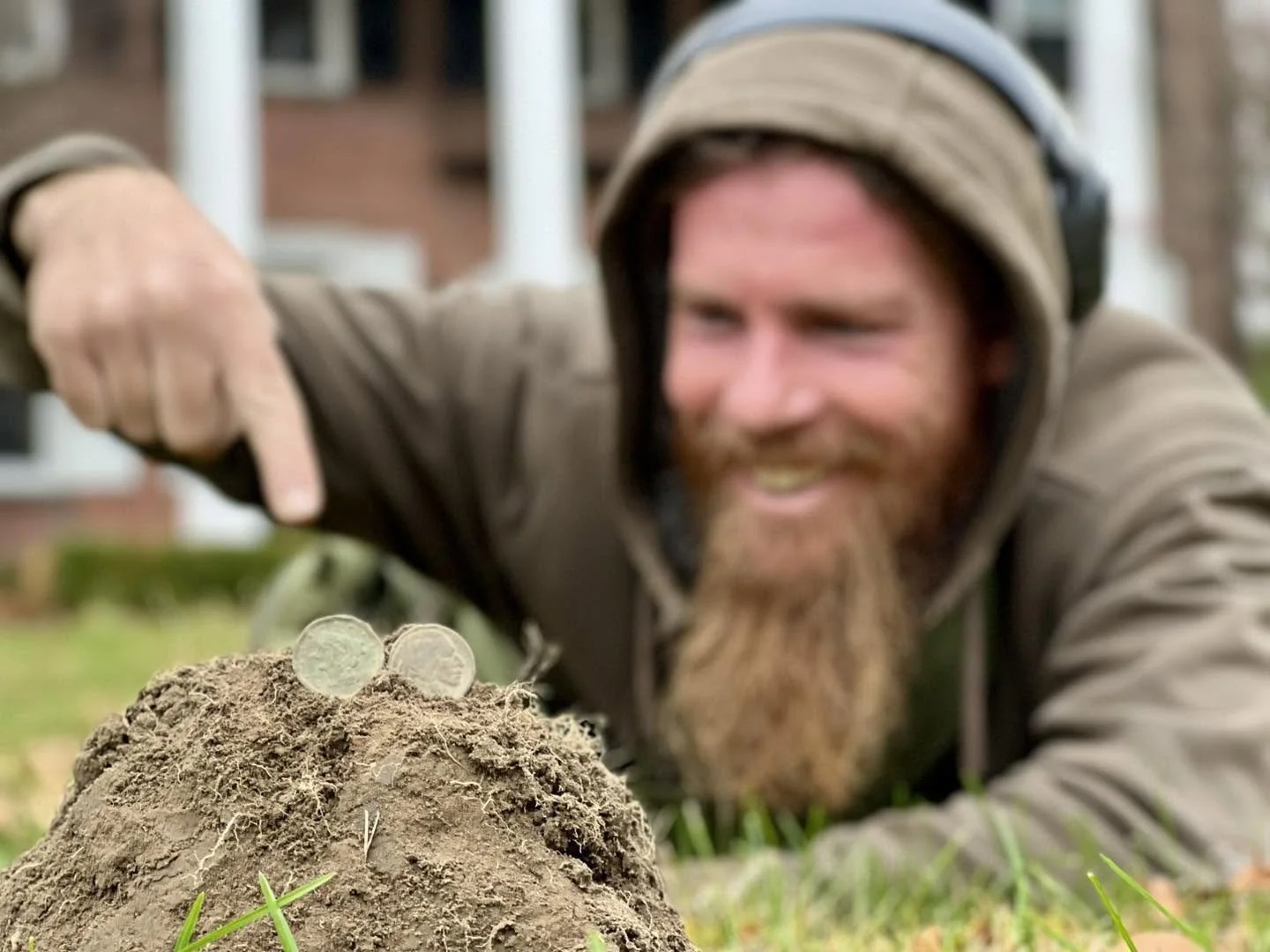 Rich VanWinkle from Quarter Hoarder posing with 2 U.S. large cents he found metal detecting