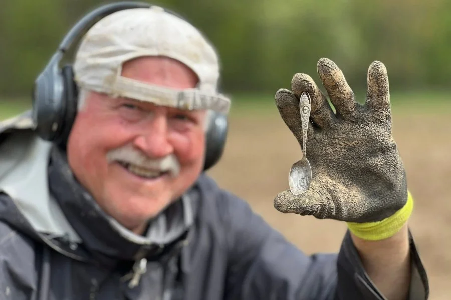 Dogtag Doug from Quarter Hoarder holding a sterling silver George Washington spoon found metal detecting