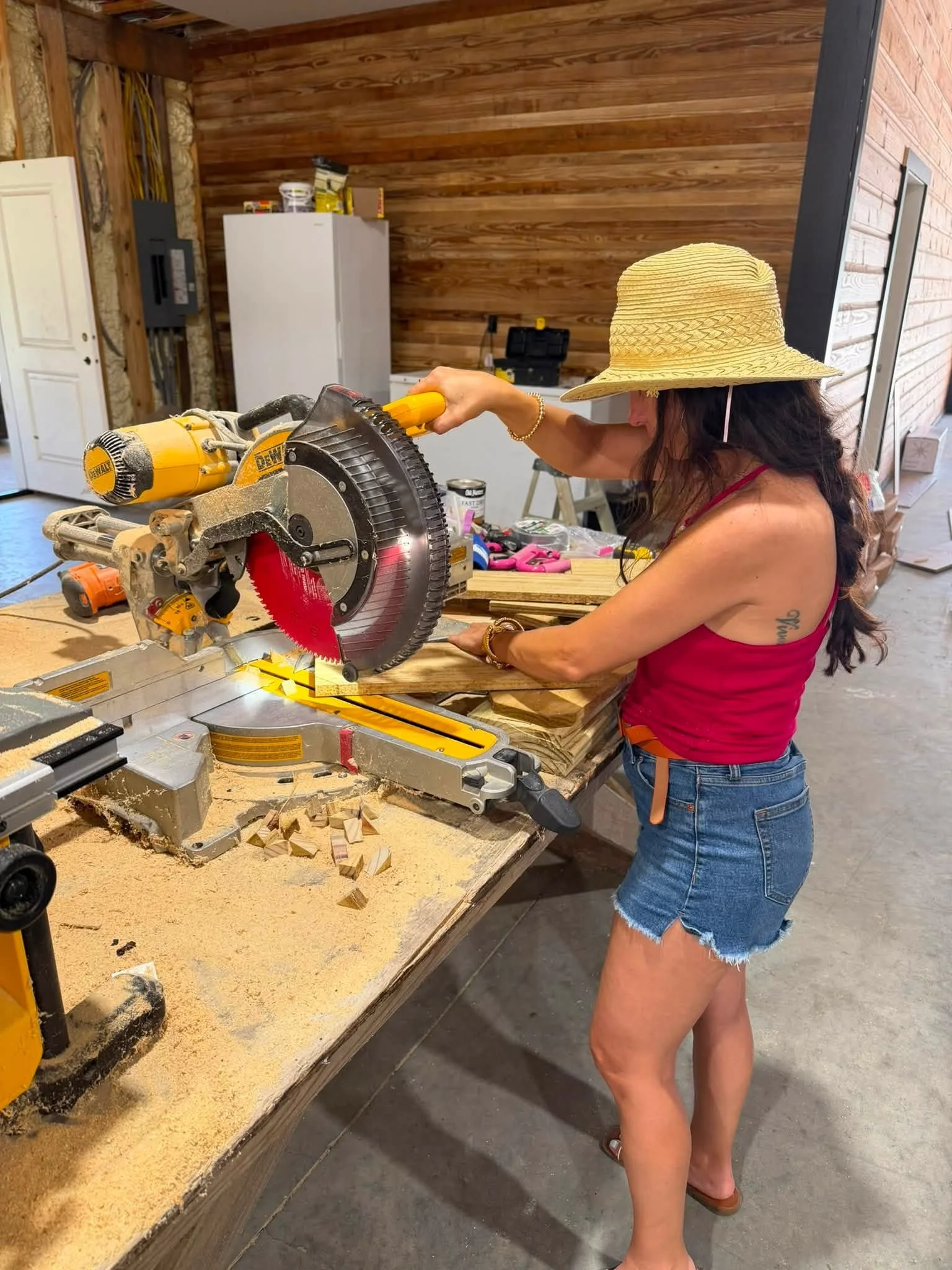 woman sawing wood