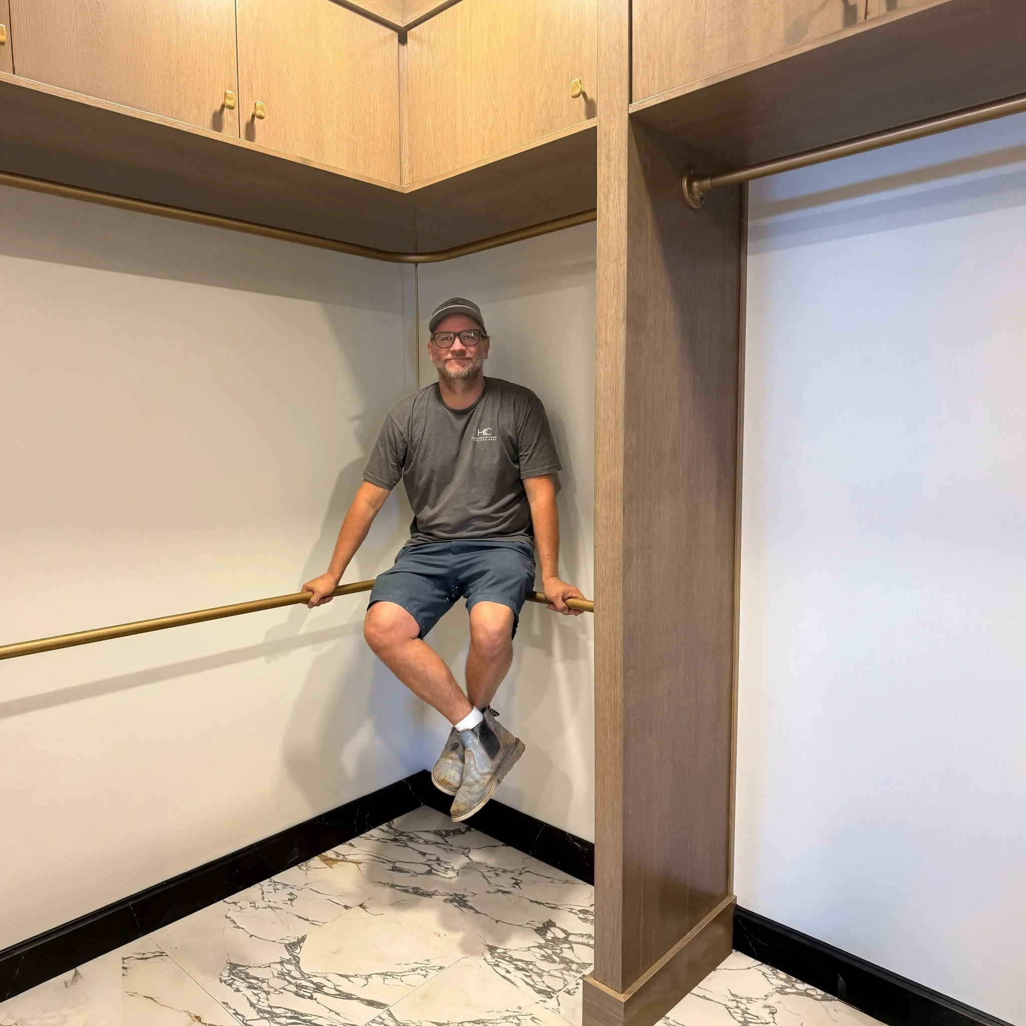 Jeremy showing how strong his work is in a custom closet