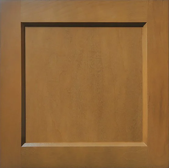 A wooden cabinet door with a raised panel design.
