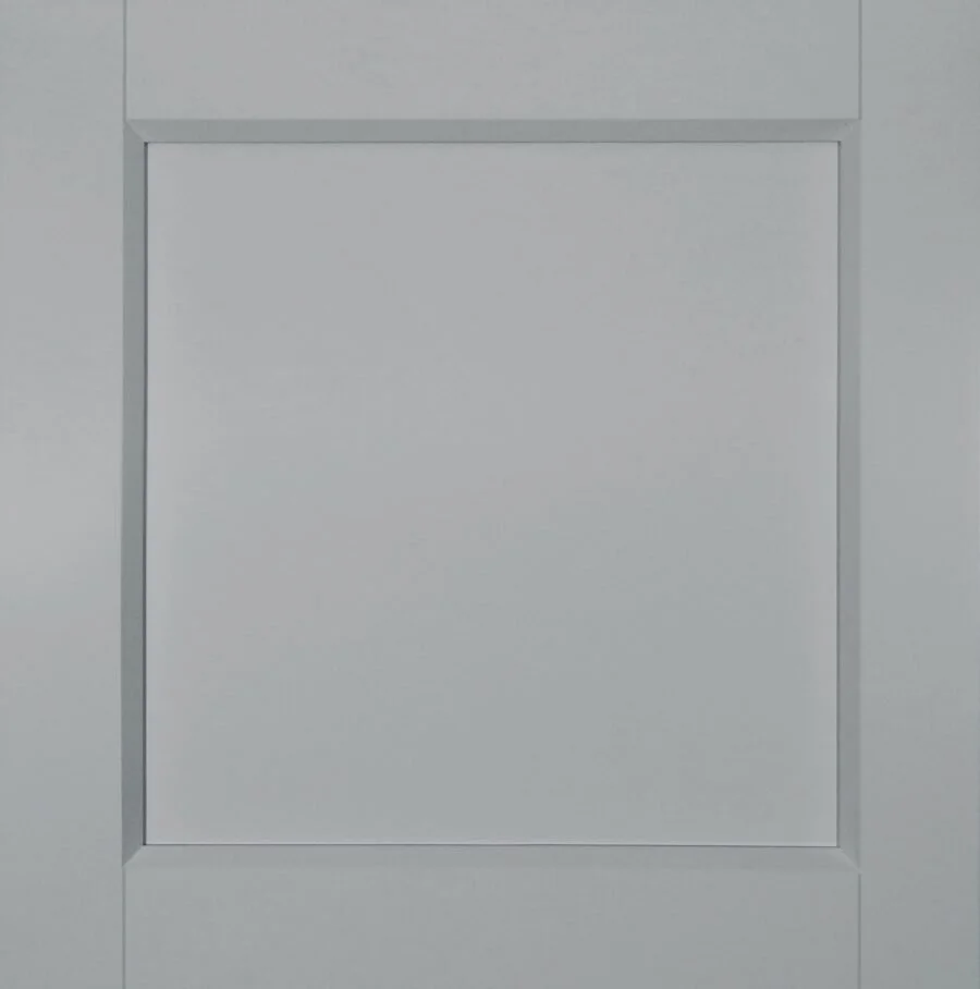 Close-up of a plain, gray, rectangular panel or door, with a simple border frame.