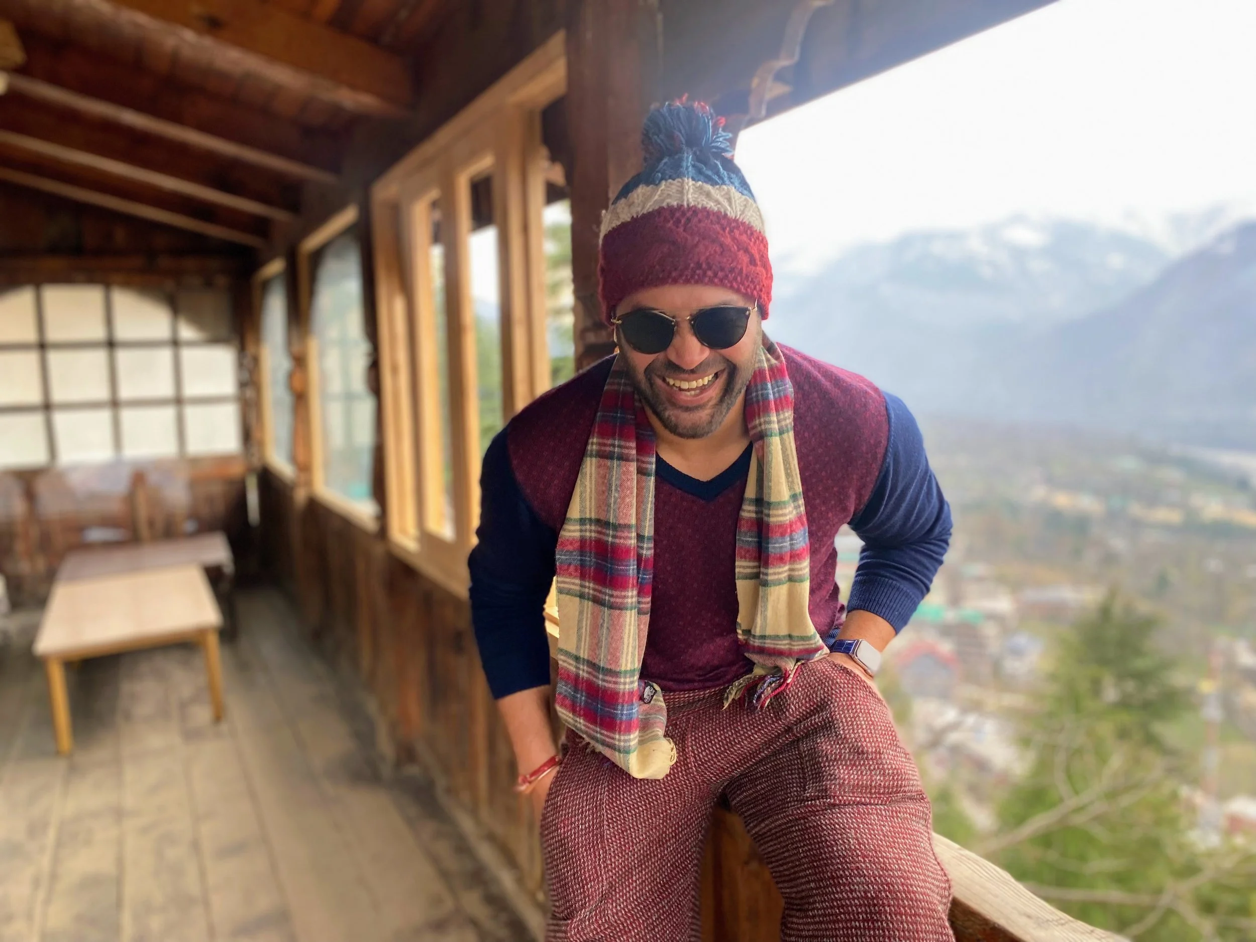 Travel & Toast founder Ajay smiling during a journey in India