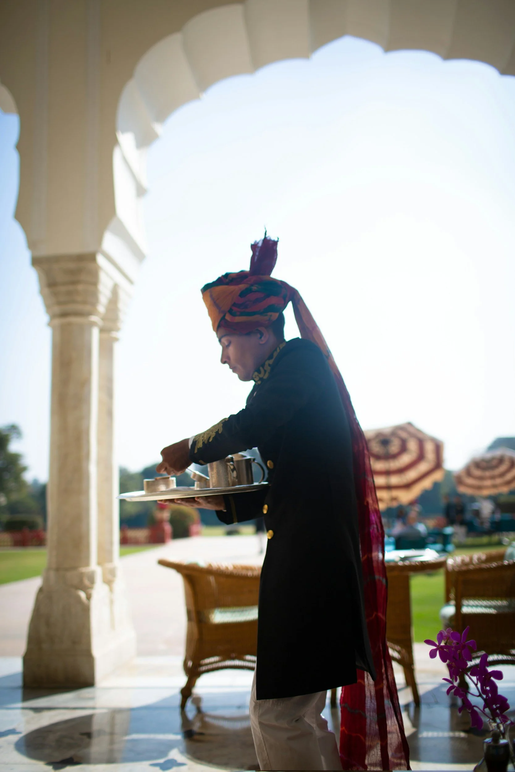India Concierge Support: Local guide assisting travelers during a private journey in India